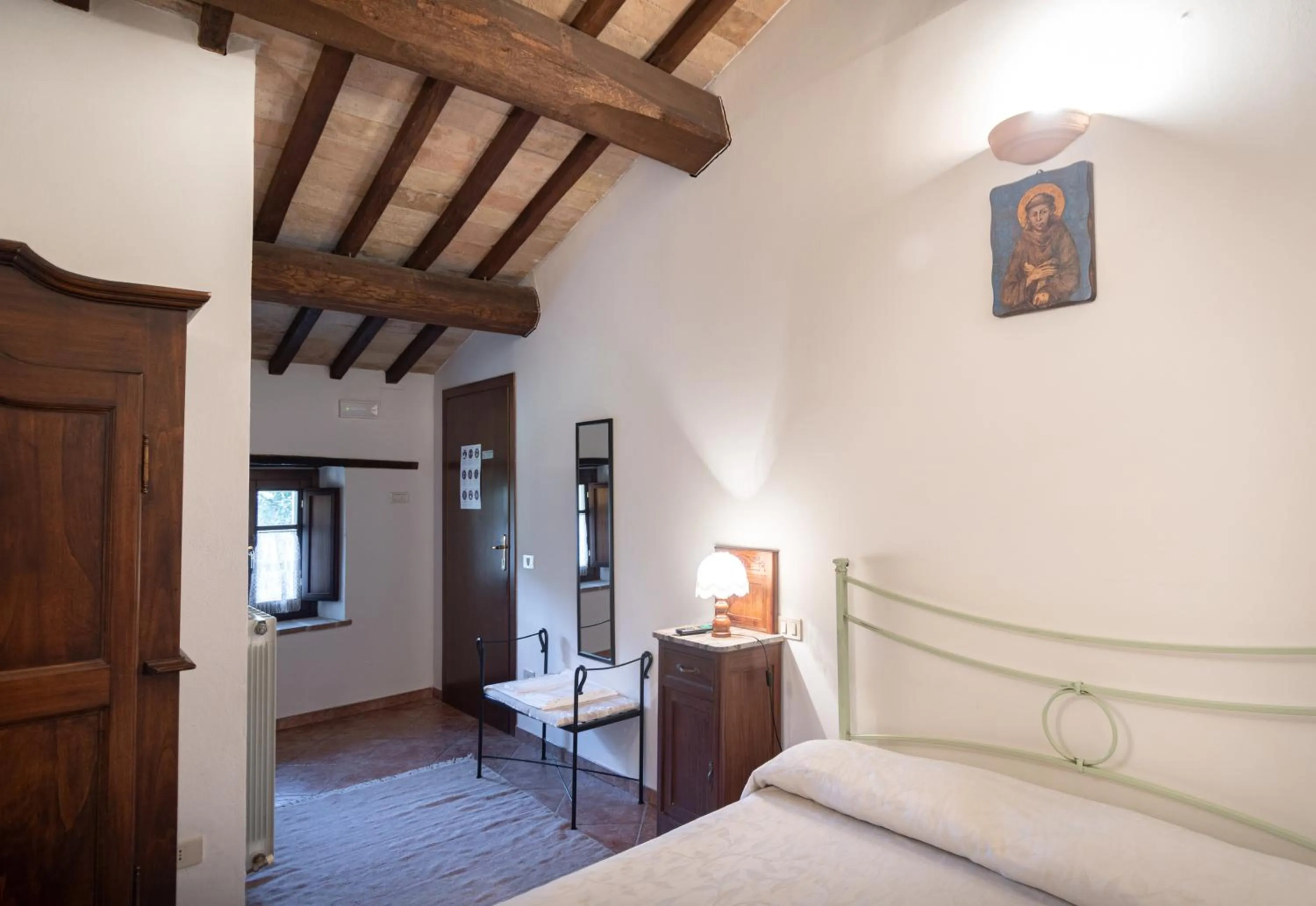 Photo of the whole room, Bed in Agriturismo Sasso Rosso