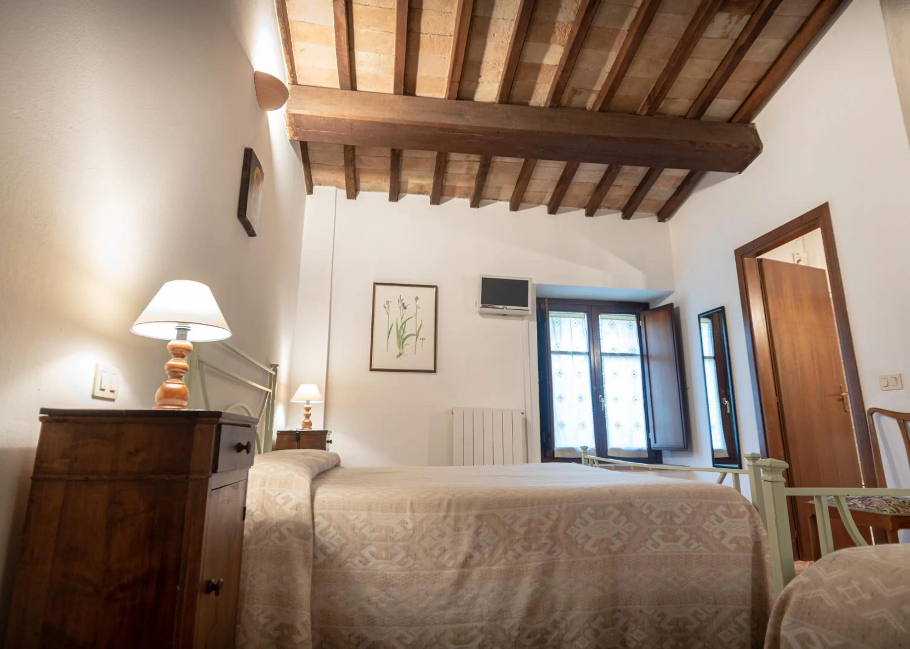 Photo of the whole room, Bed in Agriturismo Sasso Rosso