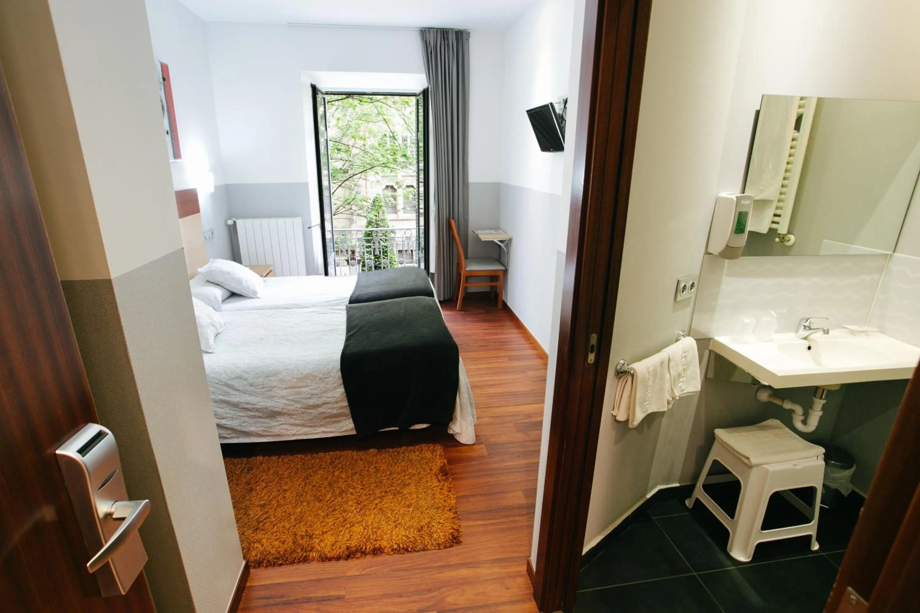 Photo of the whole room, Bed in Hostal San Ignacio Centro