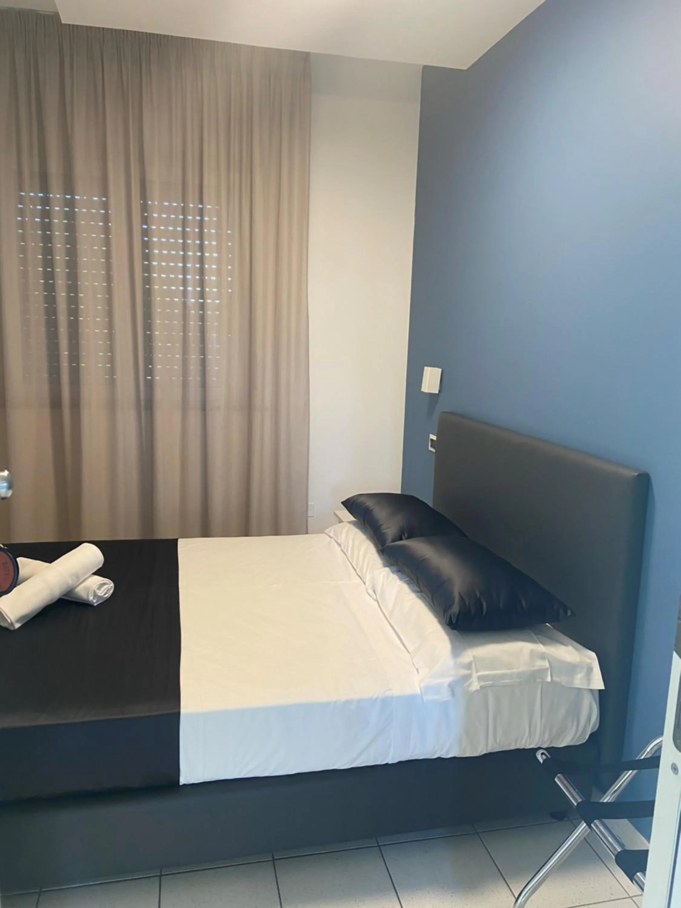 Bed in Hotel Mediterraneo