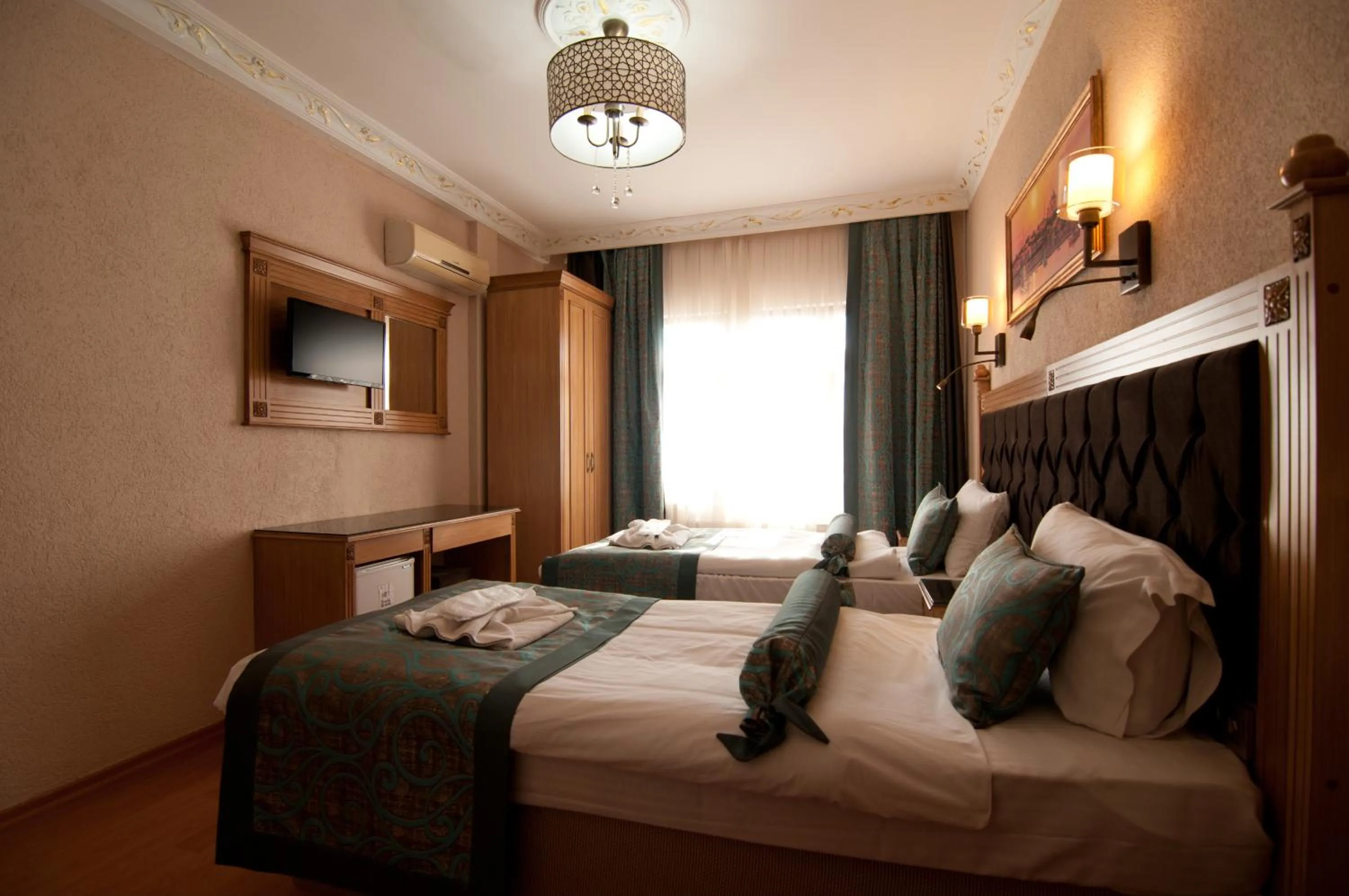 Bed in Blue Tuana Hotel Old City