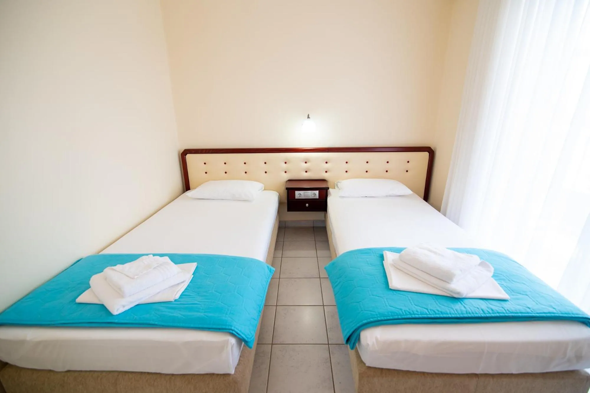 Bed in Dionisos Hotel