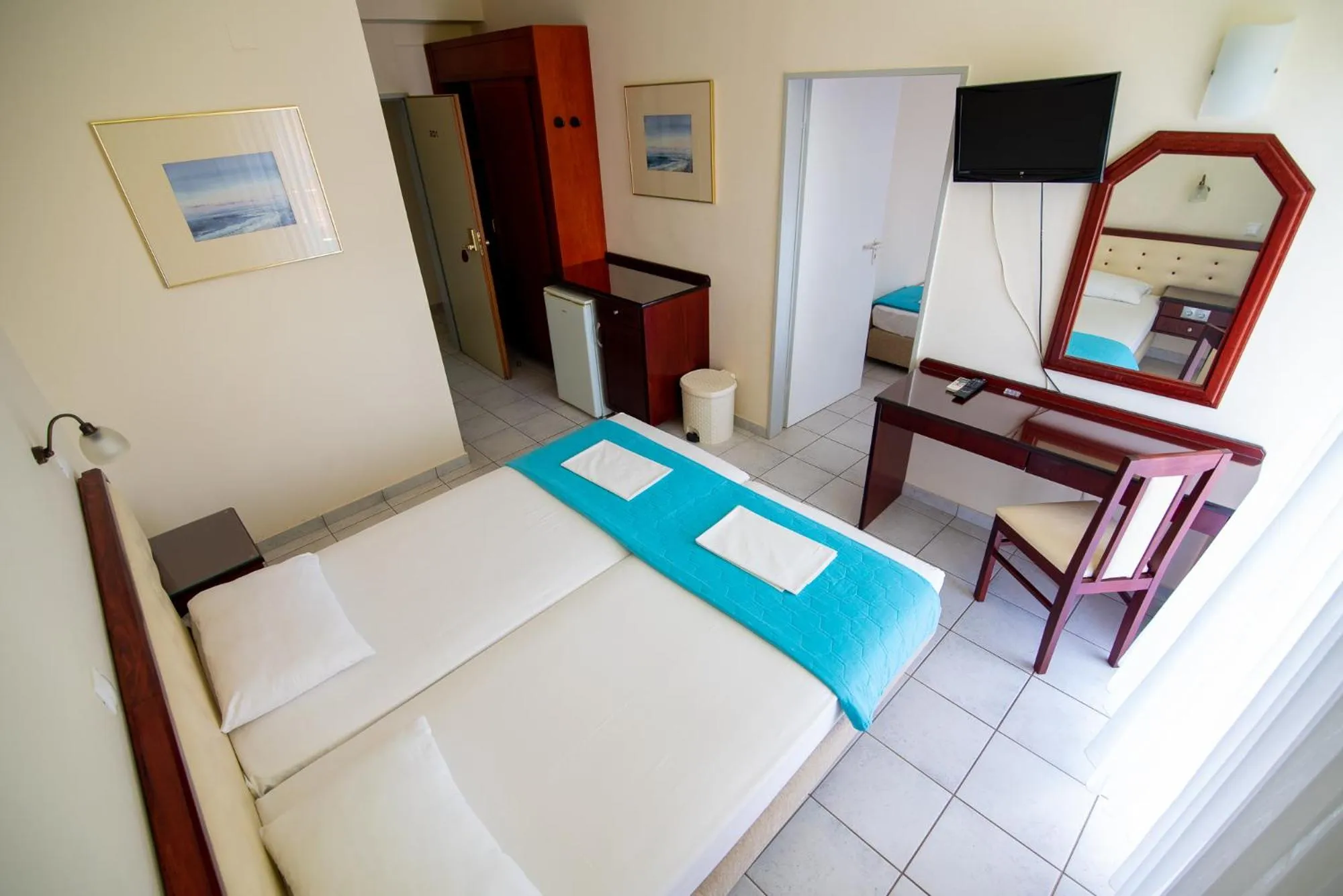 Bed in Dionisos Hotel