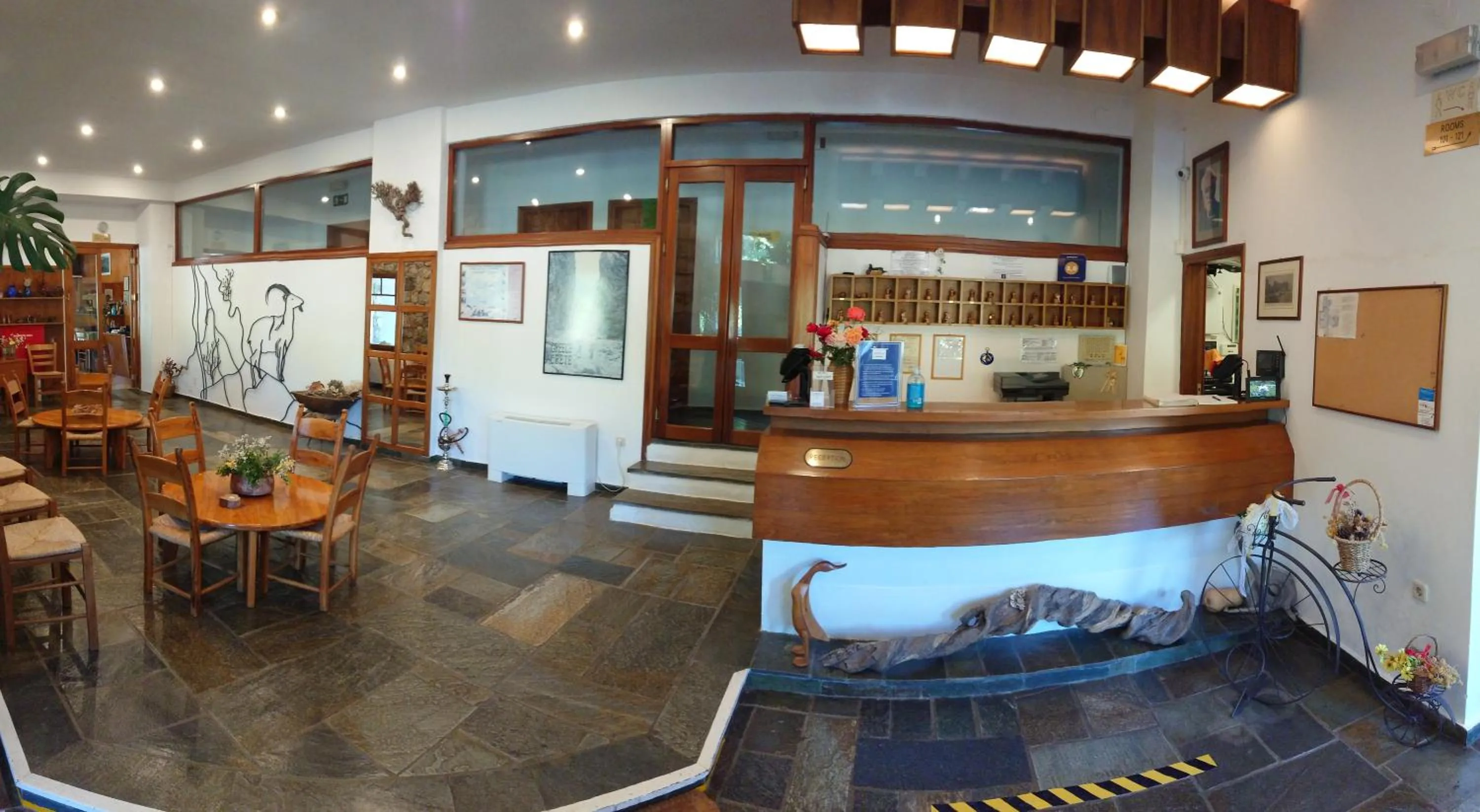 Lobby or reception in Neos Omalos Hotel