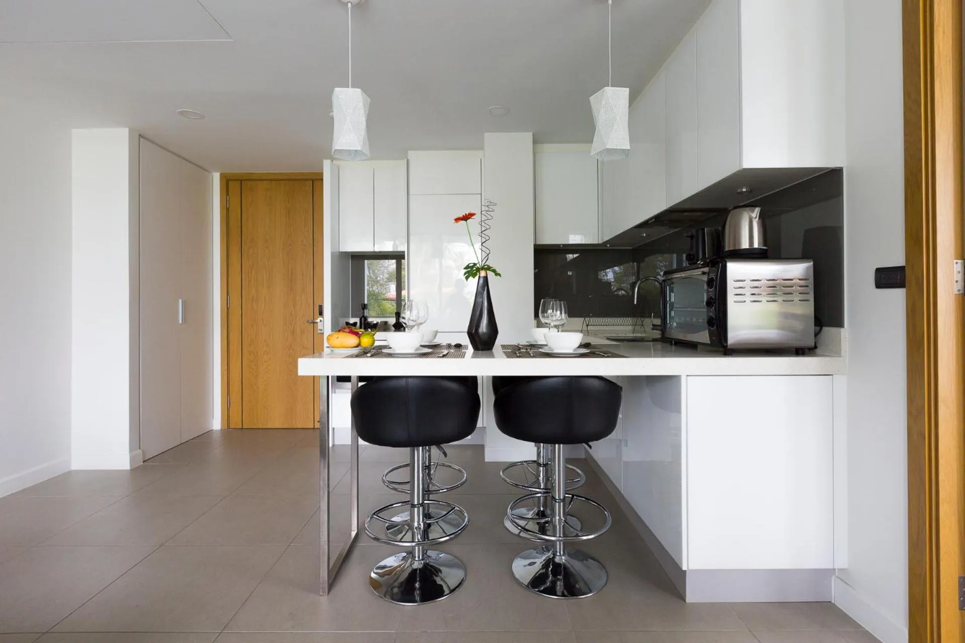 Dining area in Oceanstone by Holy Cow, 2-BR, 90 m2, pool view