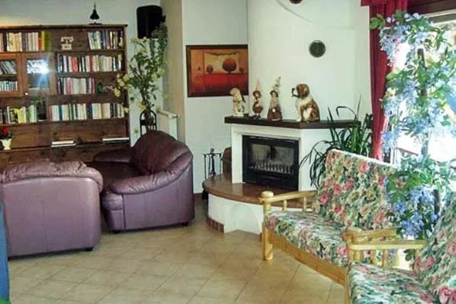 Communal lounge/ TV room in Hotel Piancastello