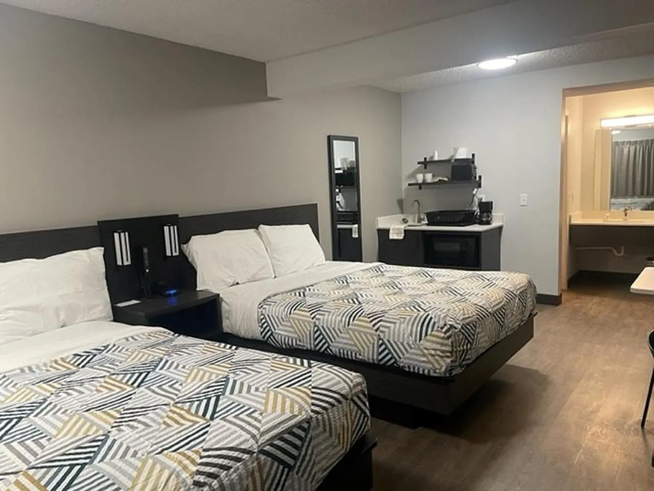 Bedroom, Bed in Studio 6 Rock Springs WY Flaming Gorge