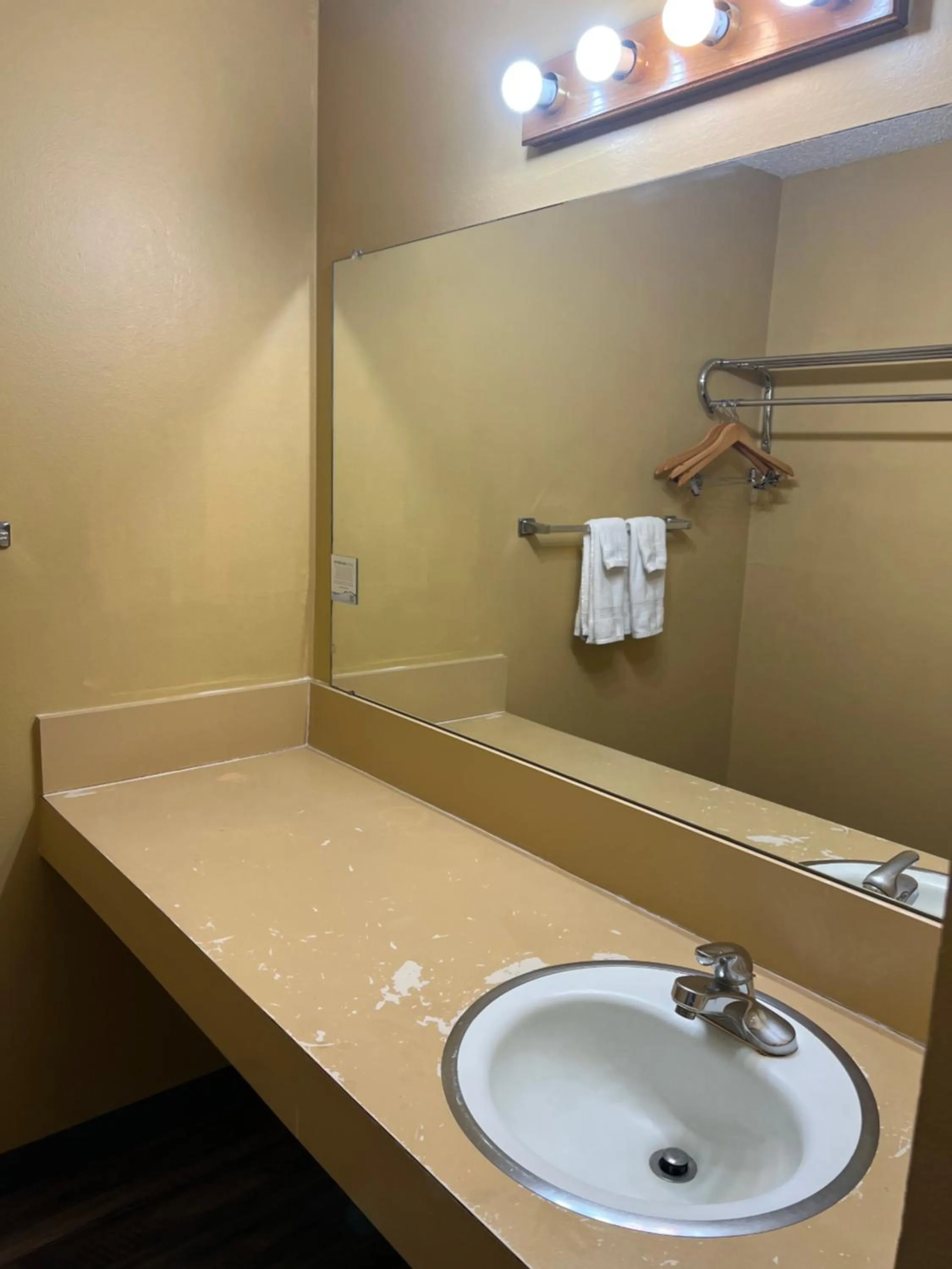 Bathroom in Travelodge by Wyndham Laramie