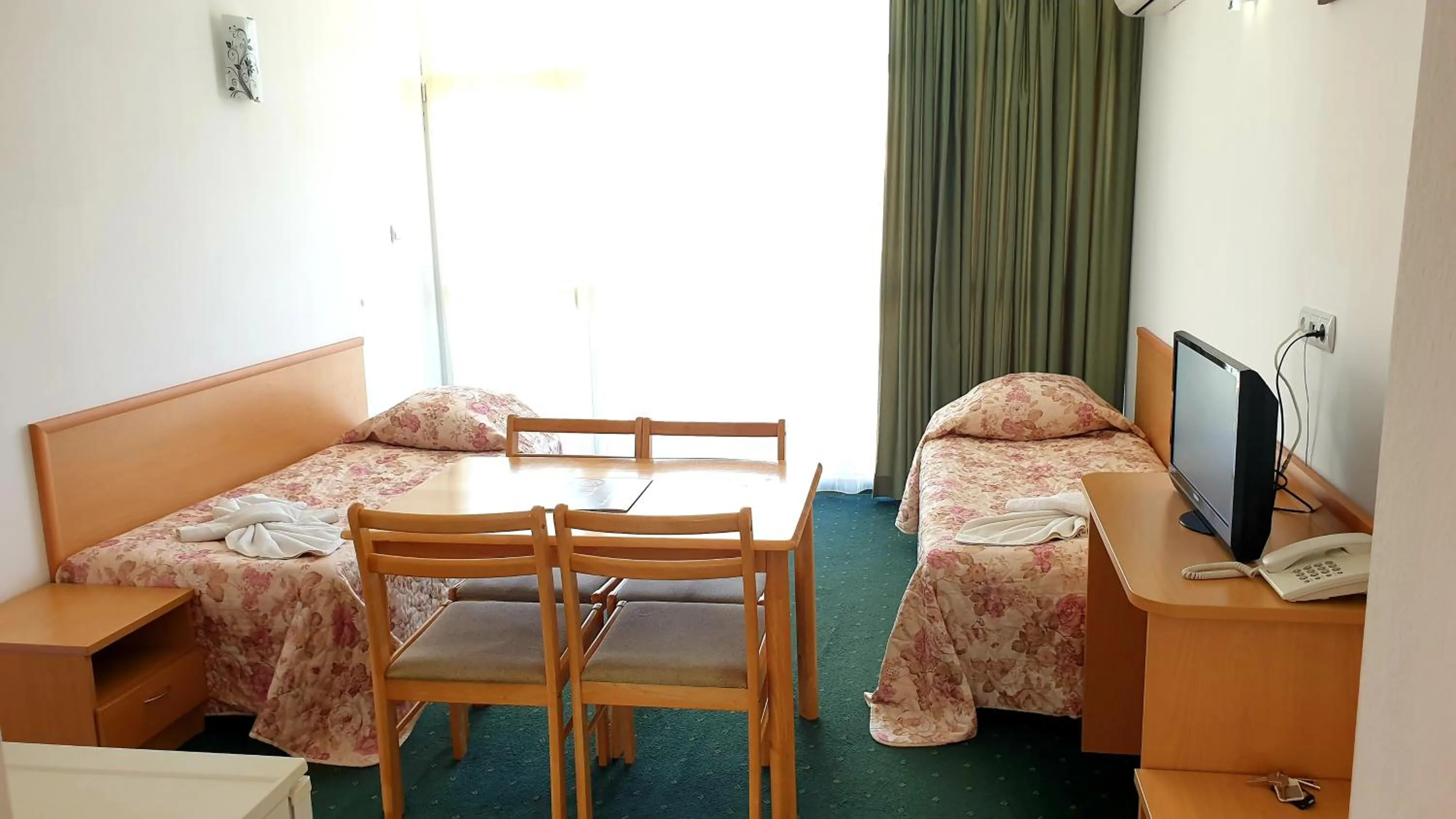 Dining area in Sunny Day Club Hotel