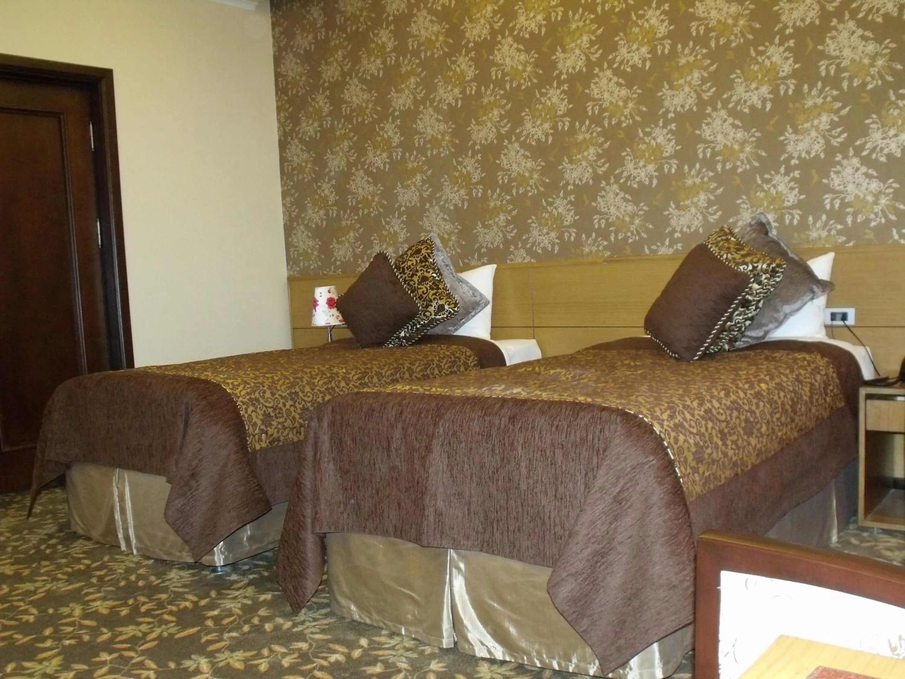 Toilet, Bed in Riviera Hotel