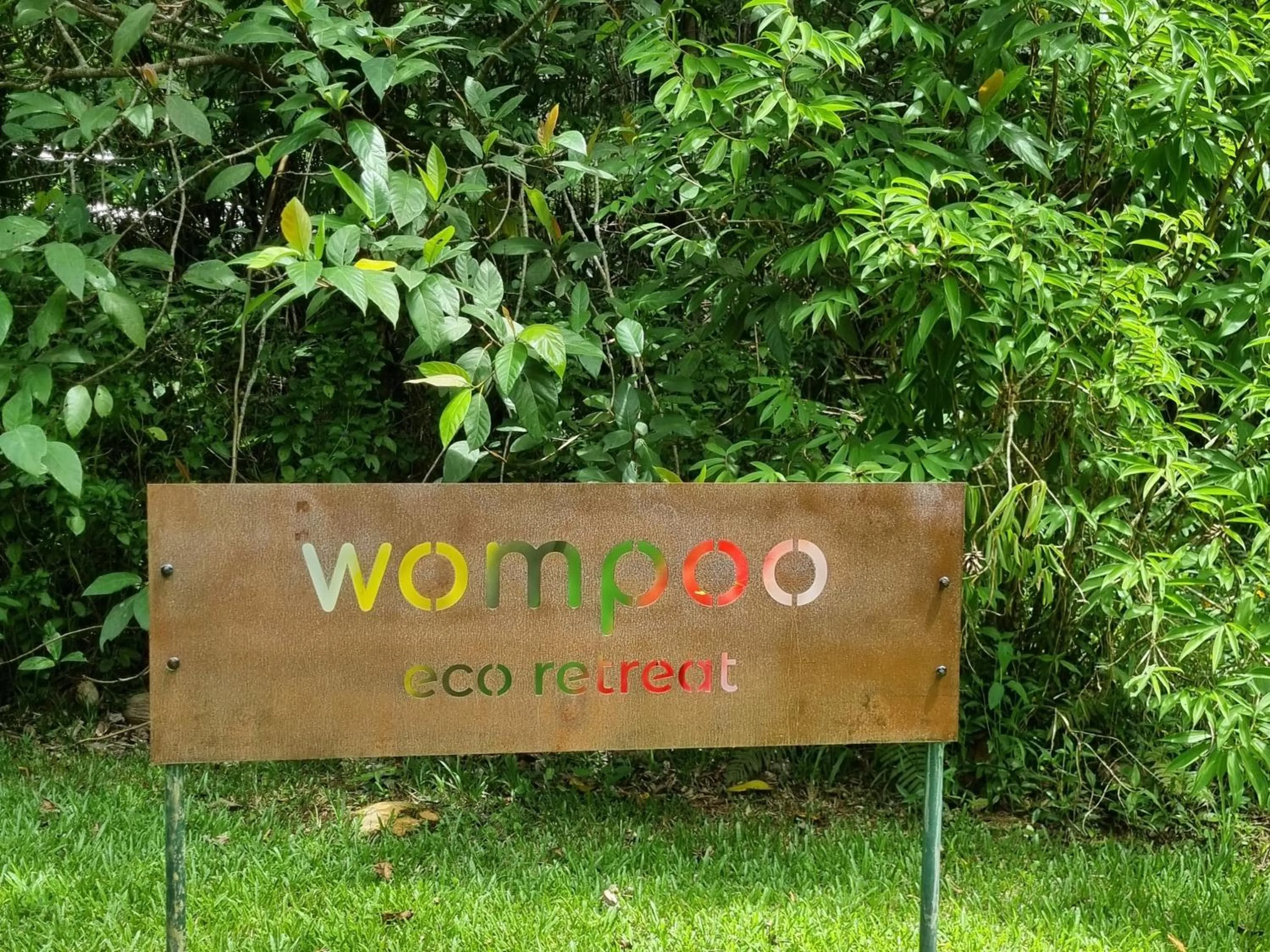 Property logo or sign in Wompoo Eco Retreat