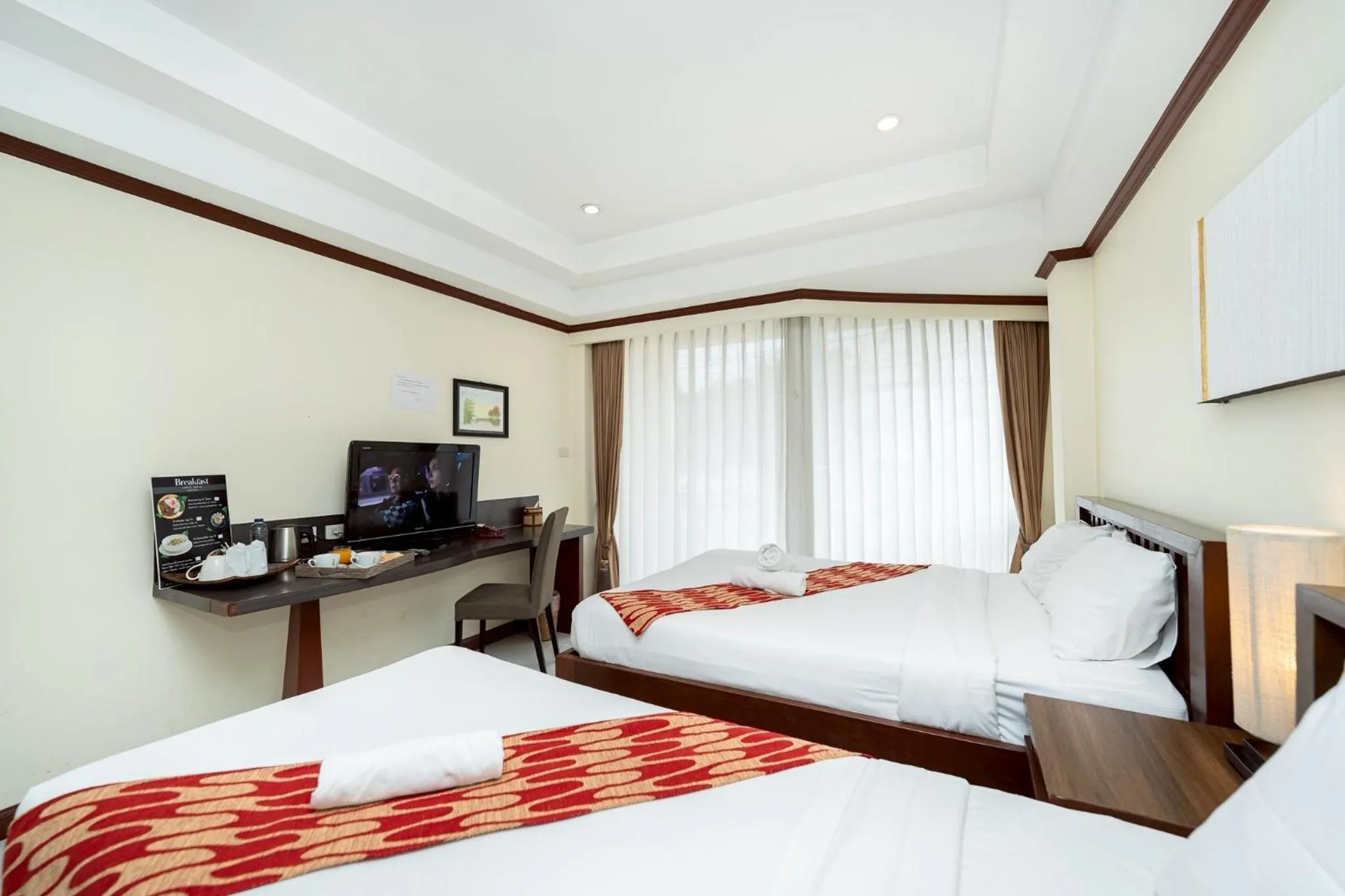 Bed in Khon Kaen Orchid Hotel