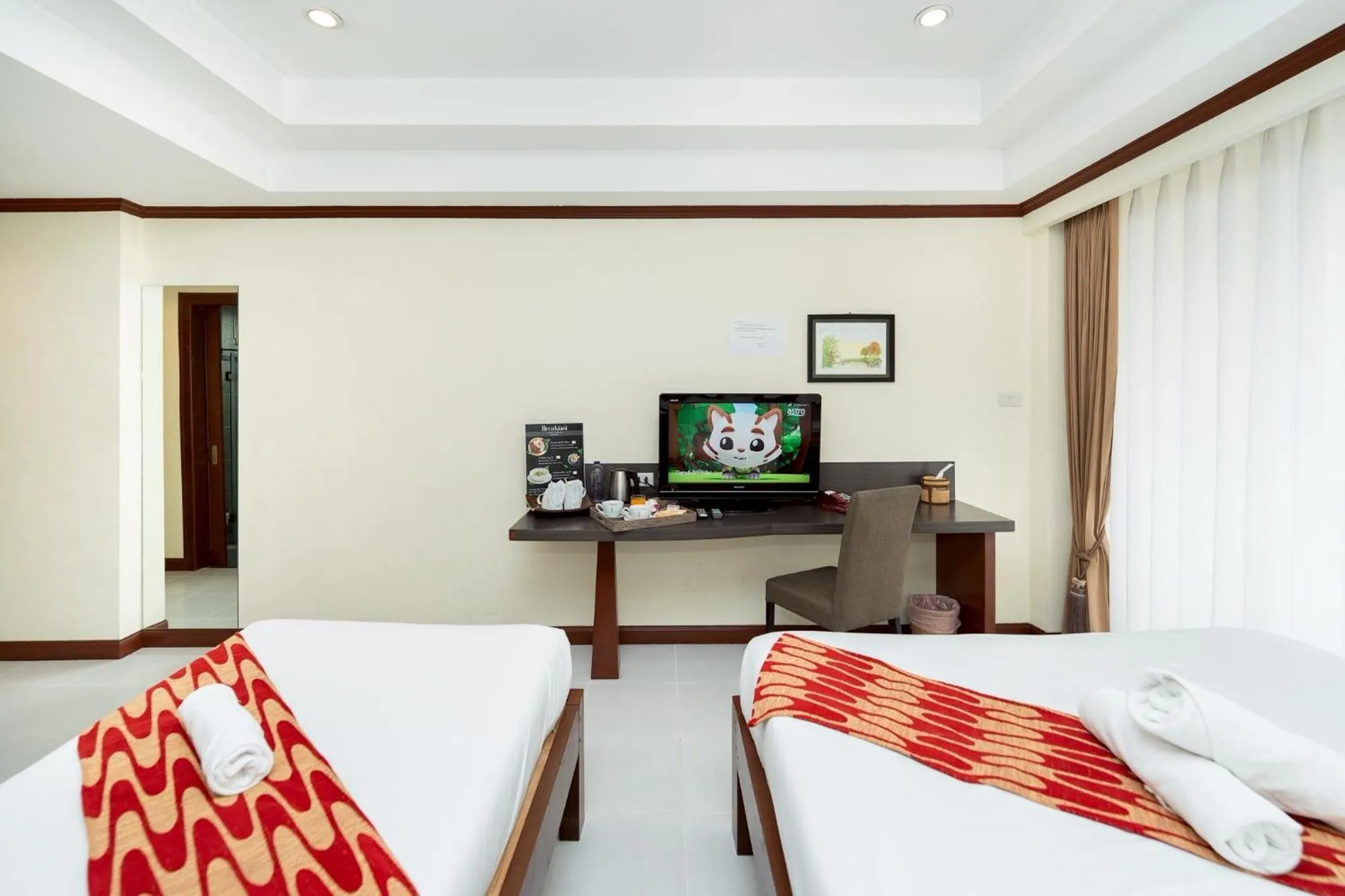 Bed in Khon Kaen Orchid Hotel