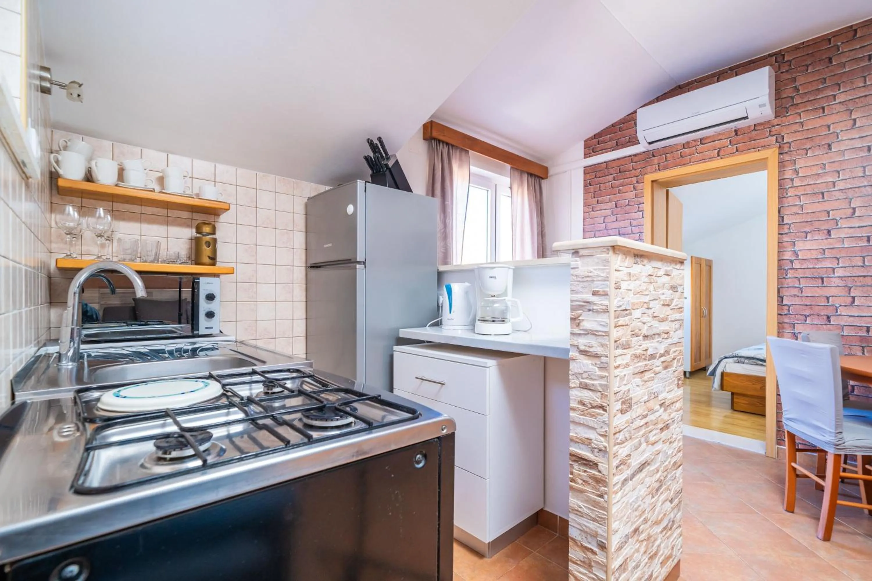 Kitchen or kitchenette in Apartments Senjo