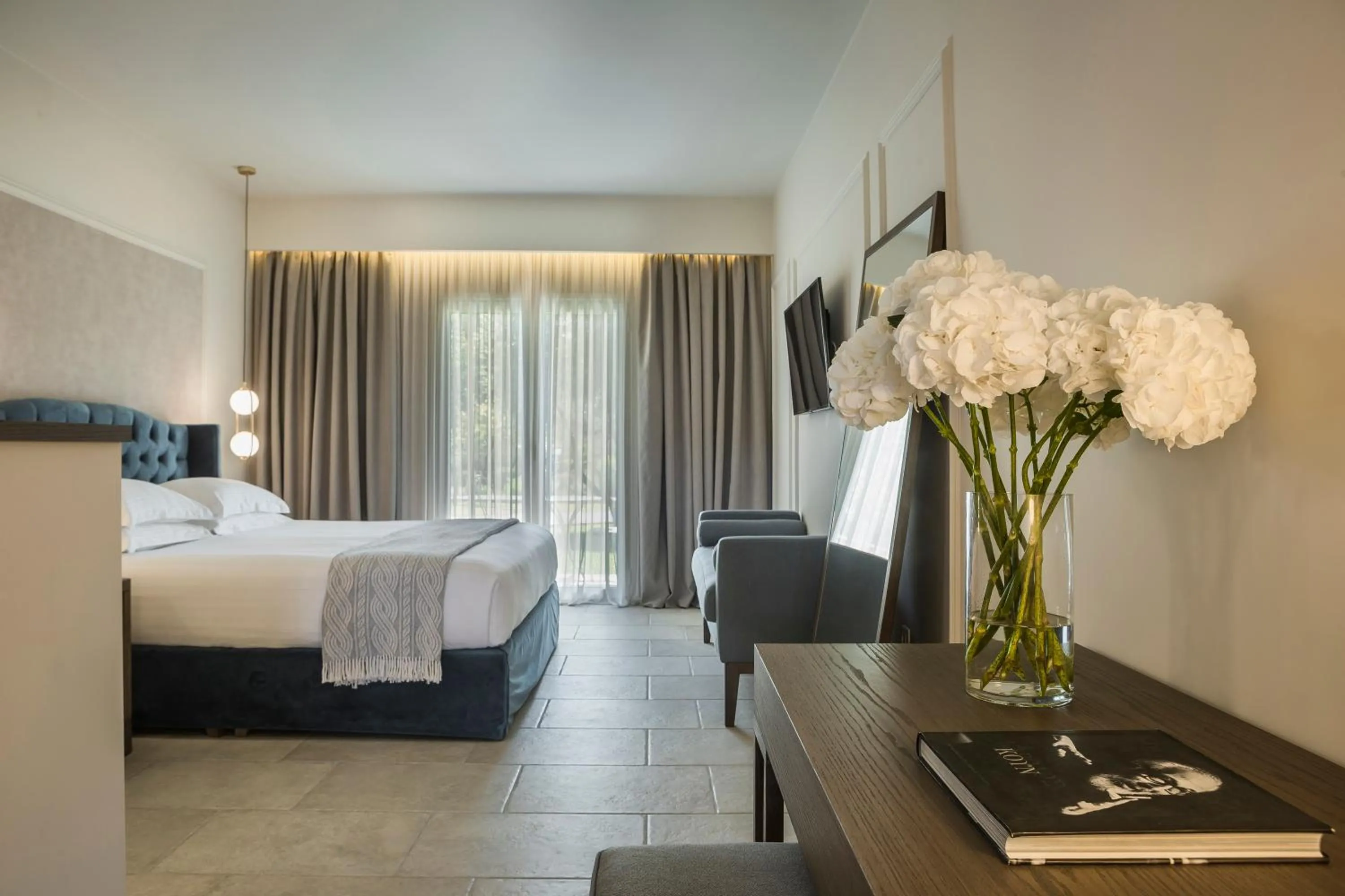 Photo of the whole room, Bed in Thalassa Boutique Hotel - Adults Only