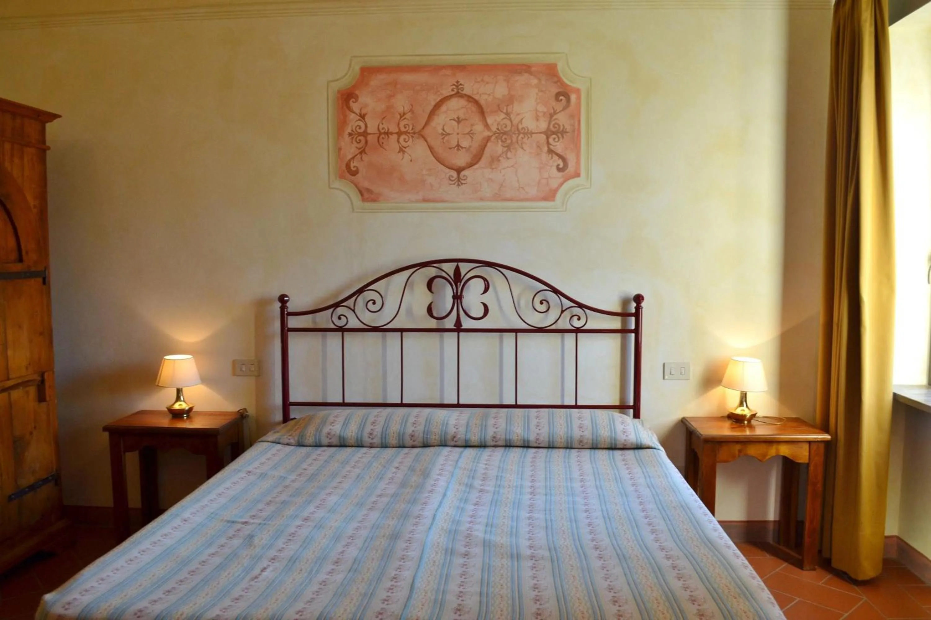 Photo of the whole room, Bed in Rocca degli Olivi
