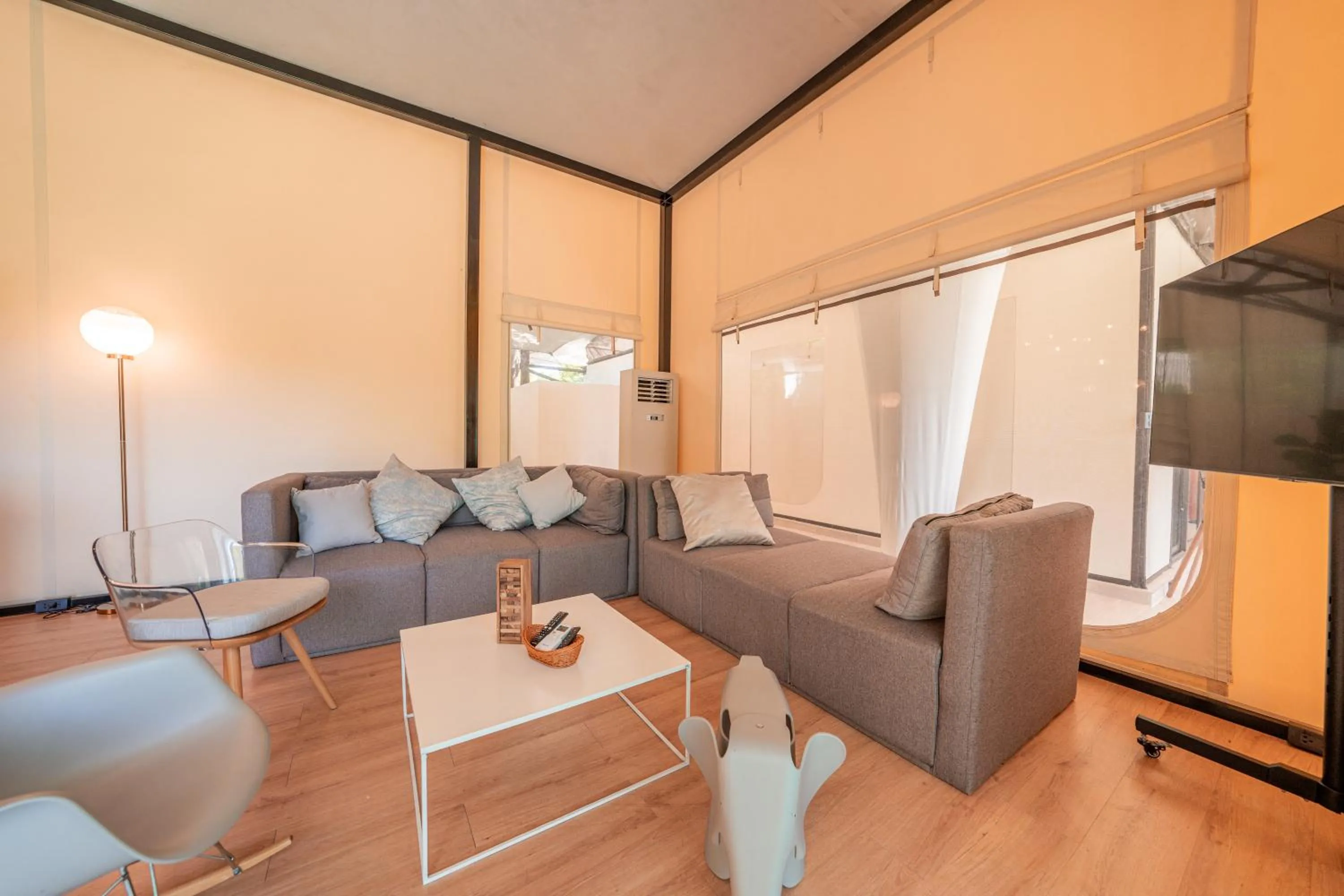 Communal lounge/ TV room in Te Mata Glamping