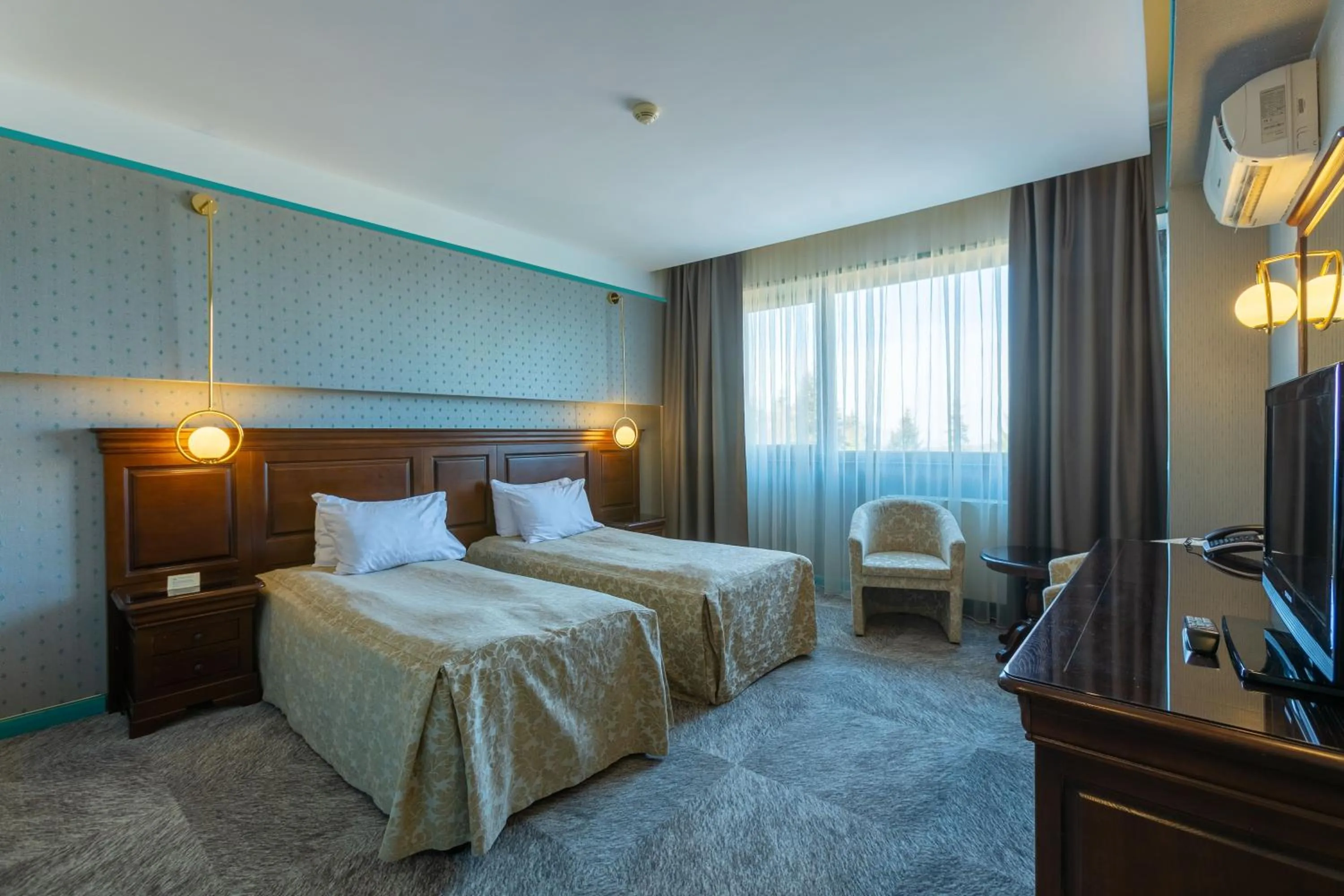 Bed in Alpin Resort Hotel