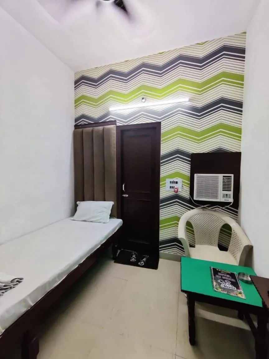 Bed in Hotel Jai Surya