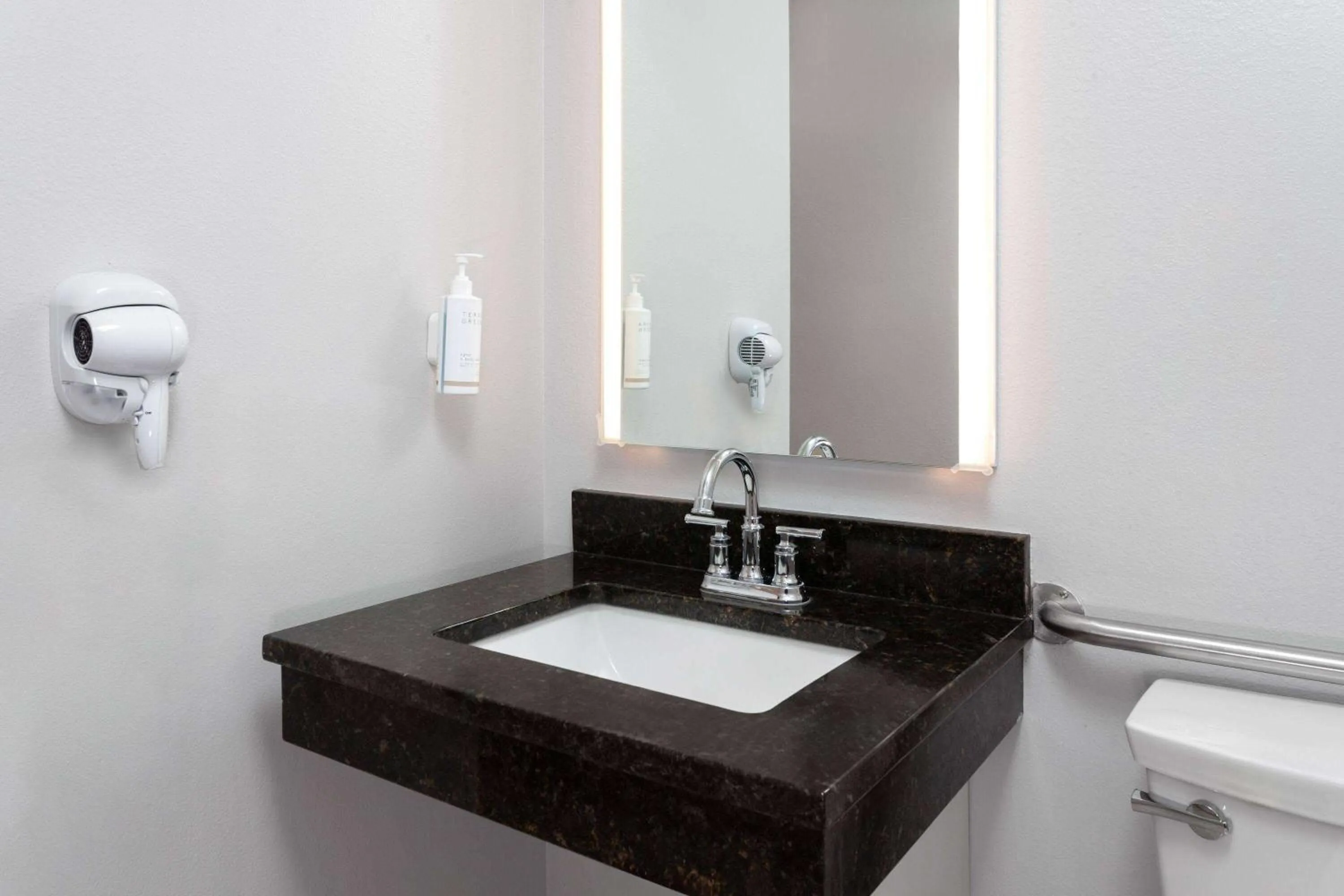 Shower in Microtel Inn by Wyndham Janesville