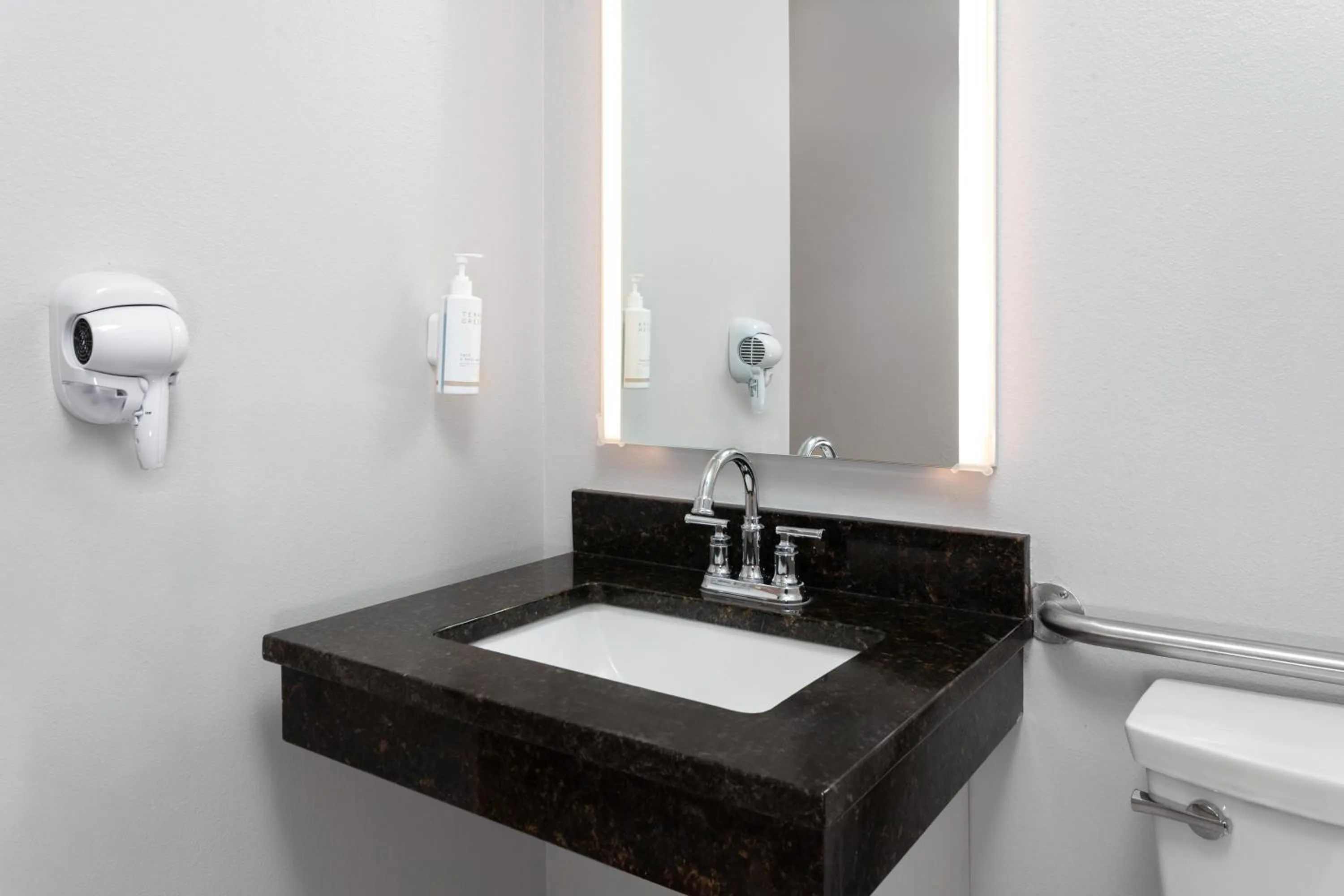 Bathroom in Microtel Inn by Wyndham Janesville