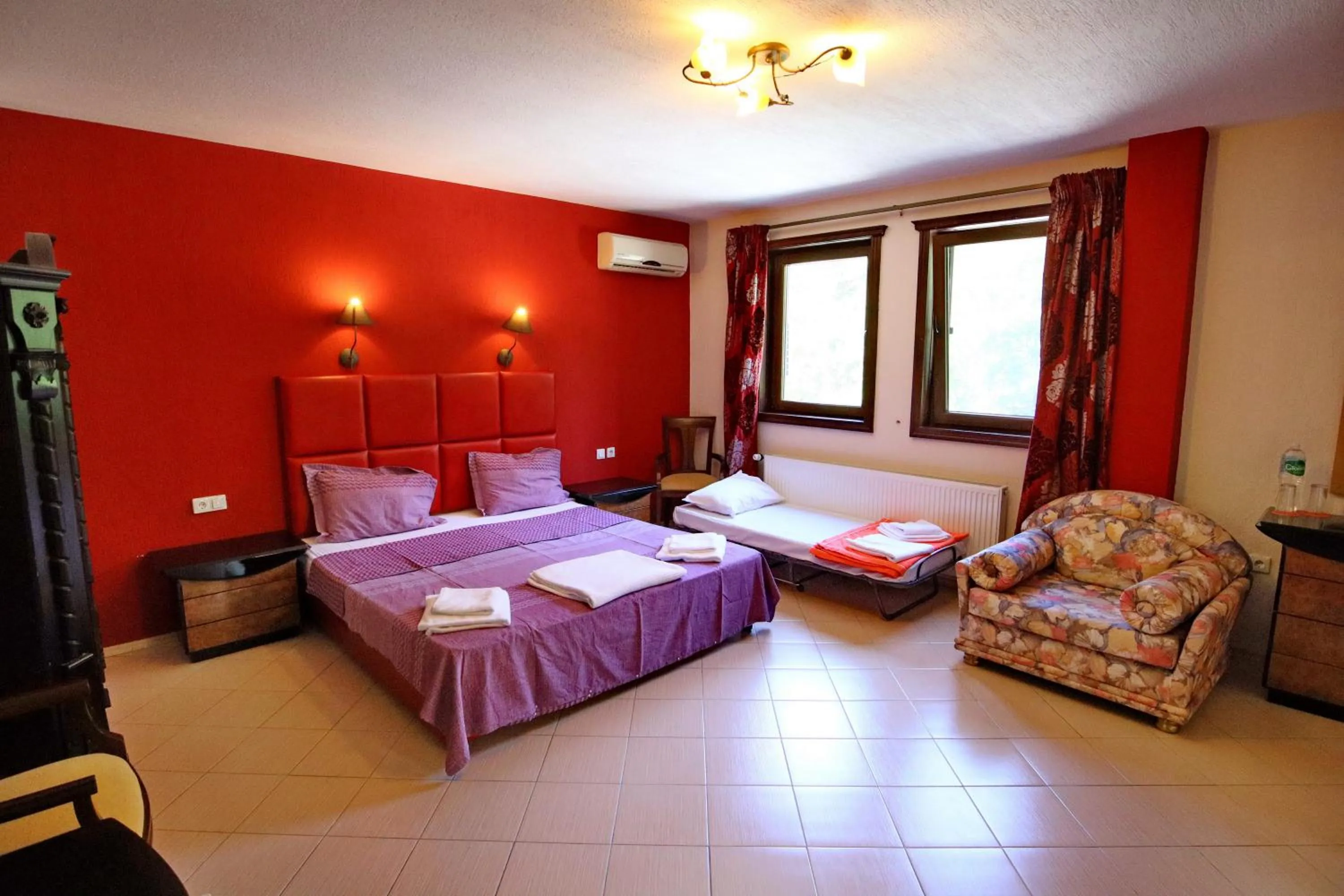 Bed in Elli Greco Hotel