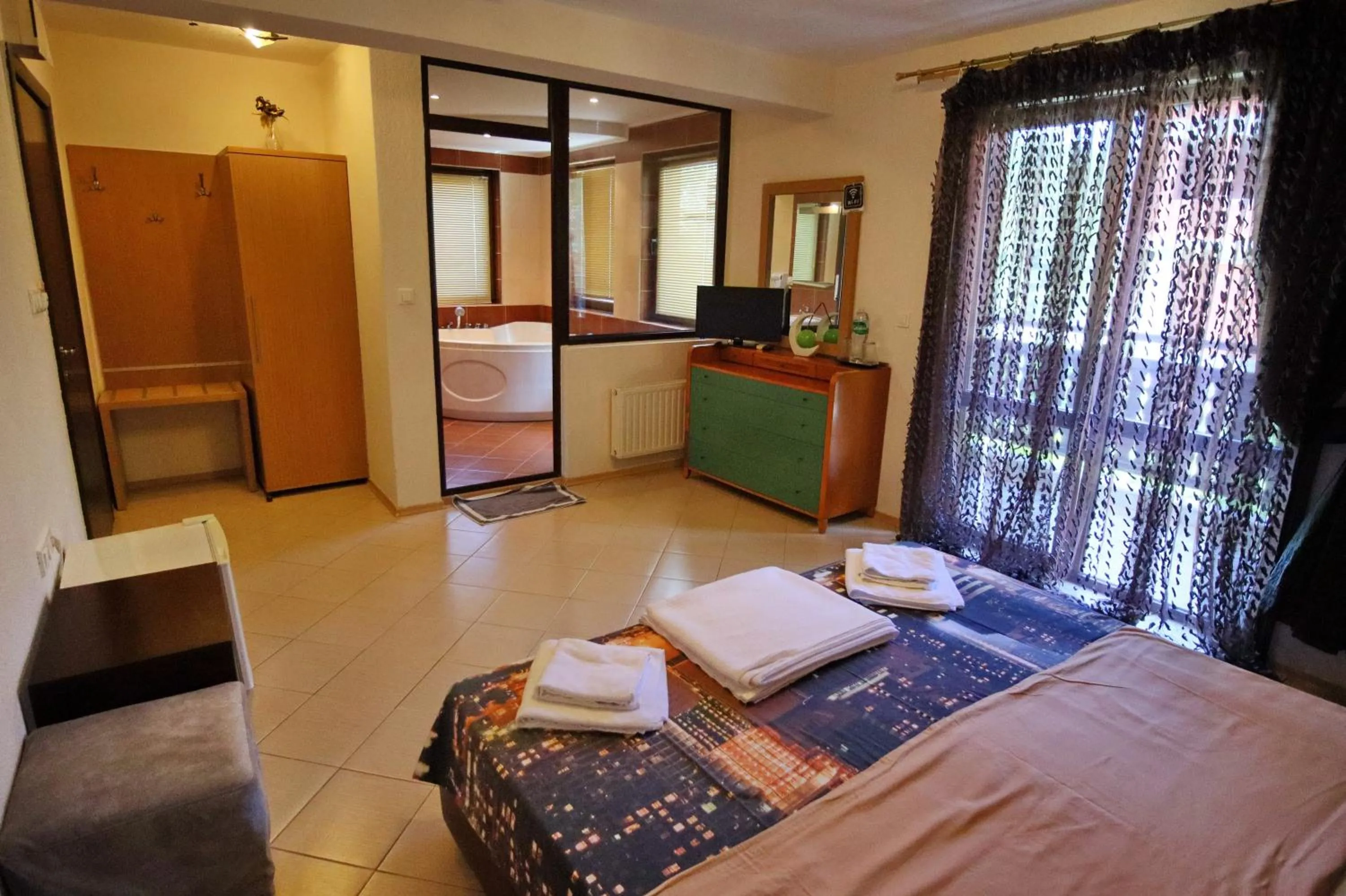 Bed in Elli Greco Hotel