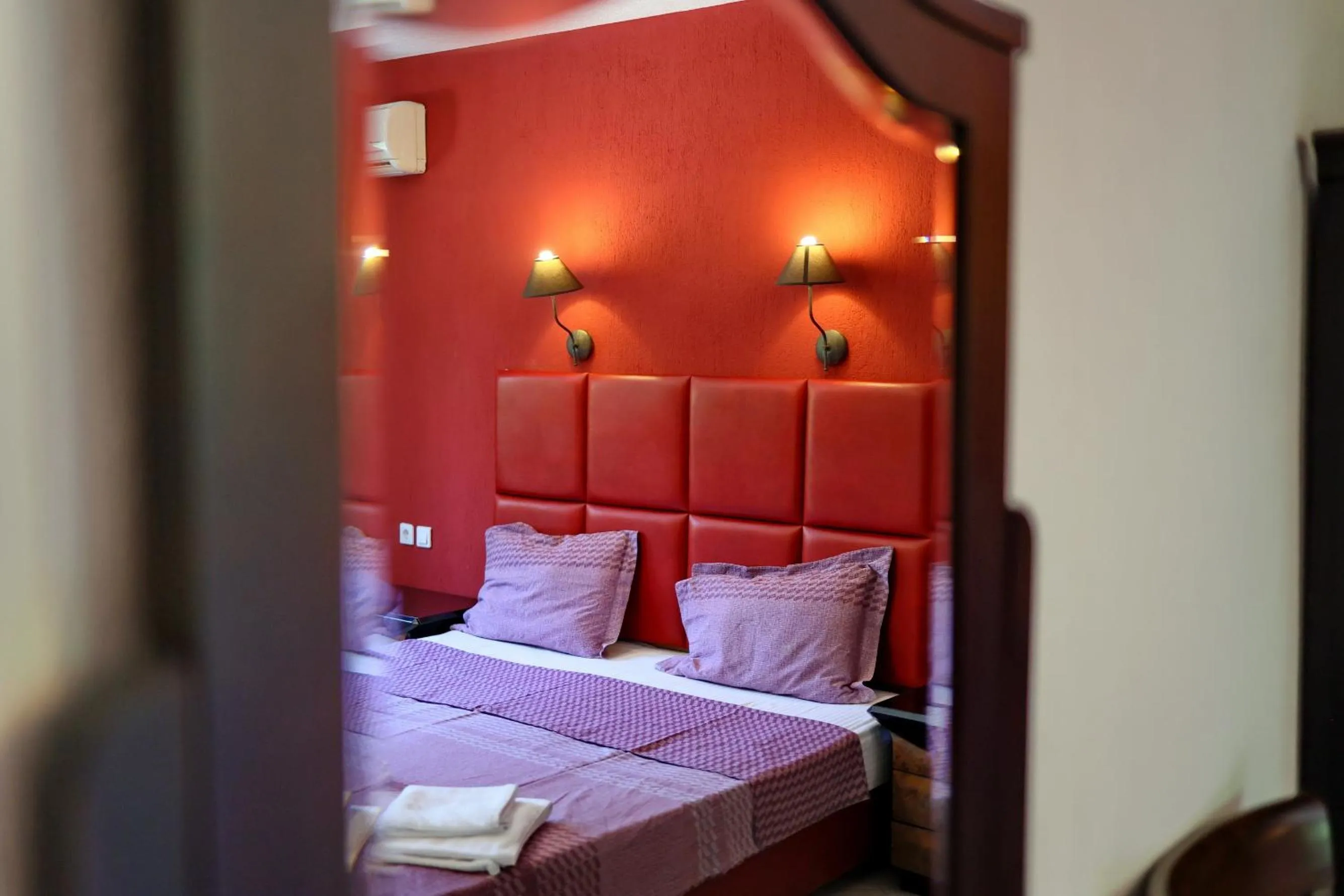 Bed in Elli Greco Hotel