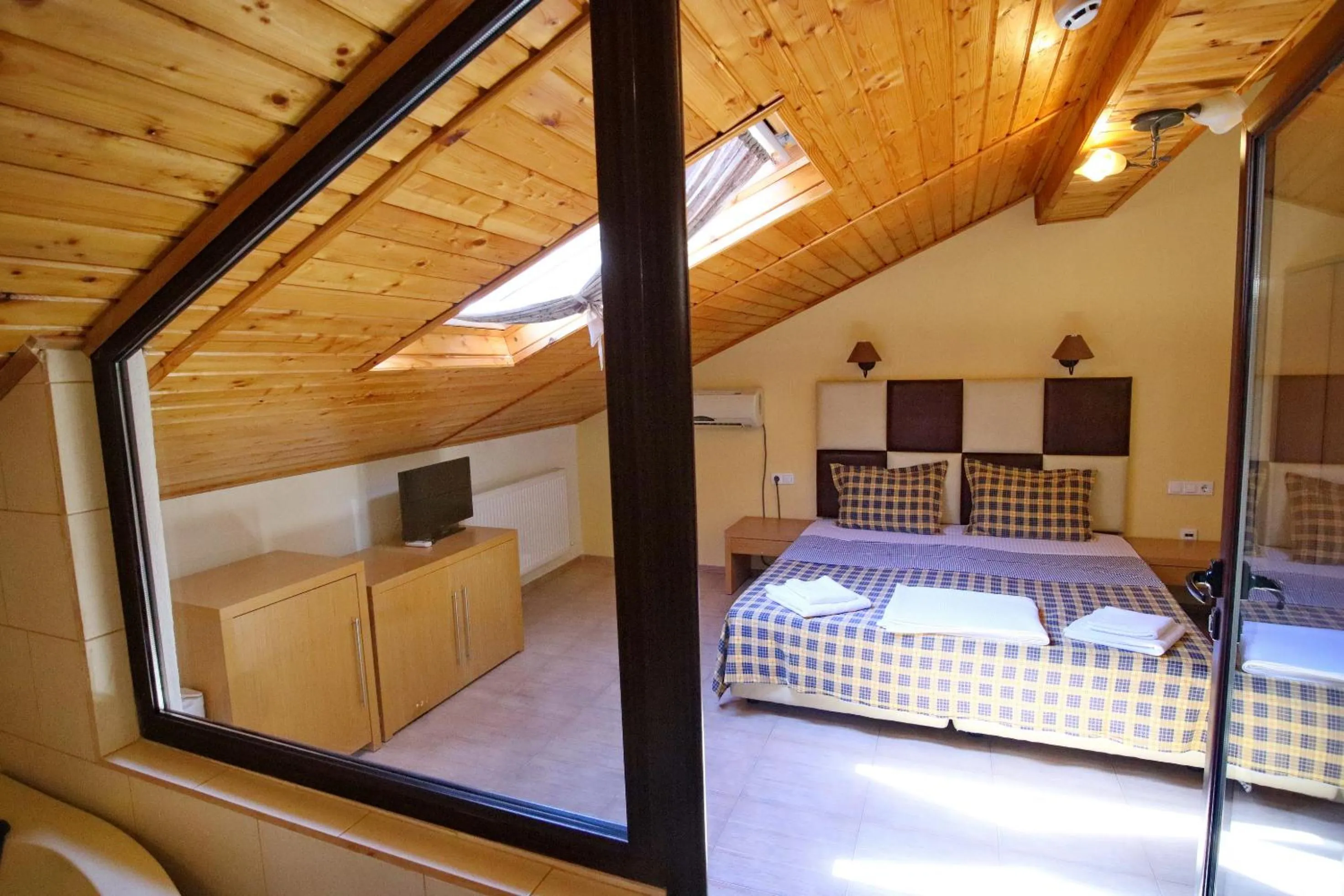 Bed in Elli Greco Hotel