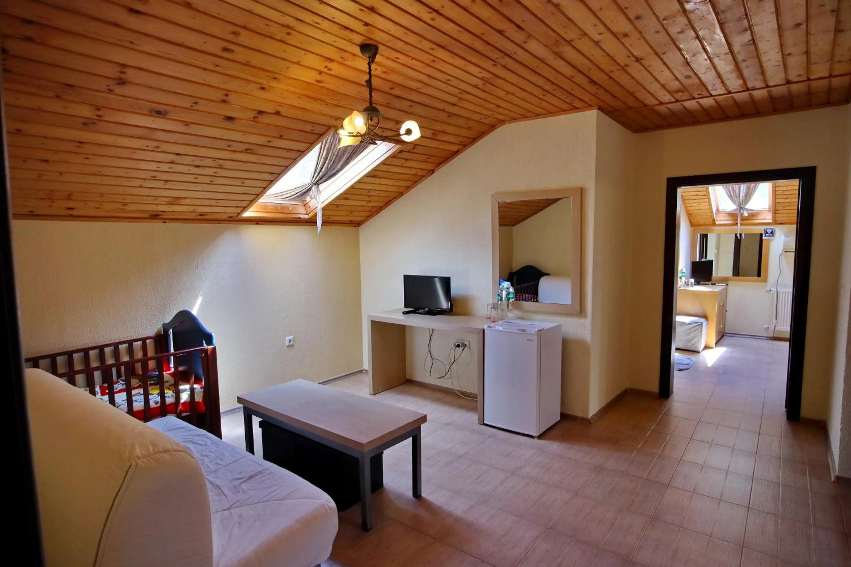 Bed in Elli Greco Hotel