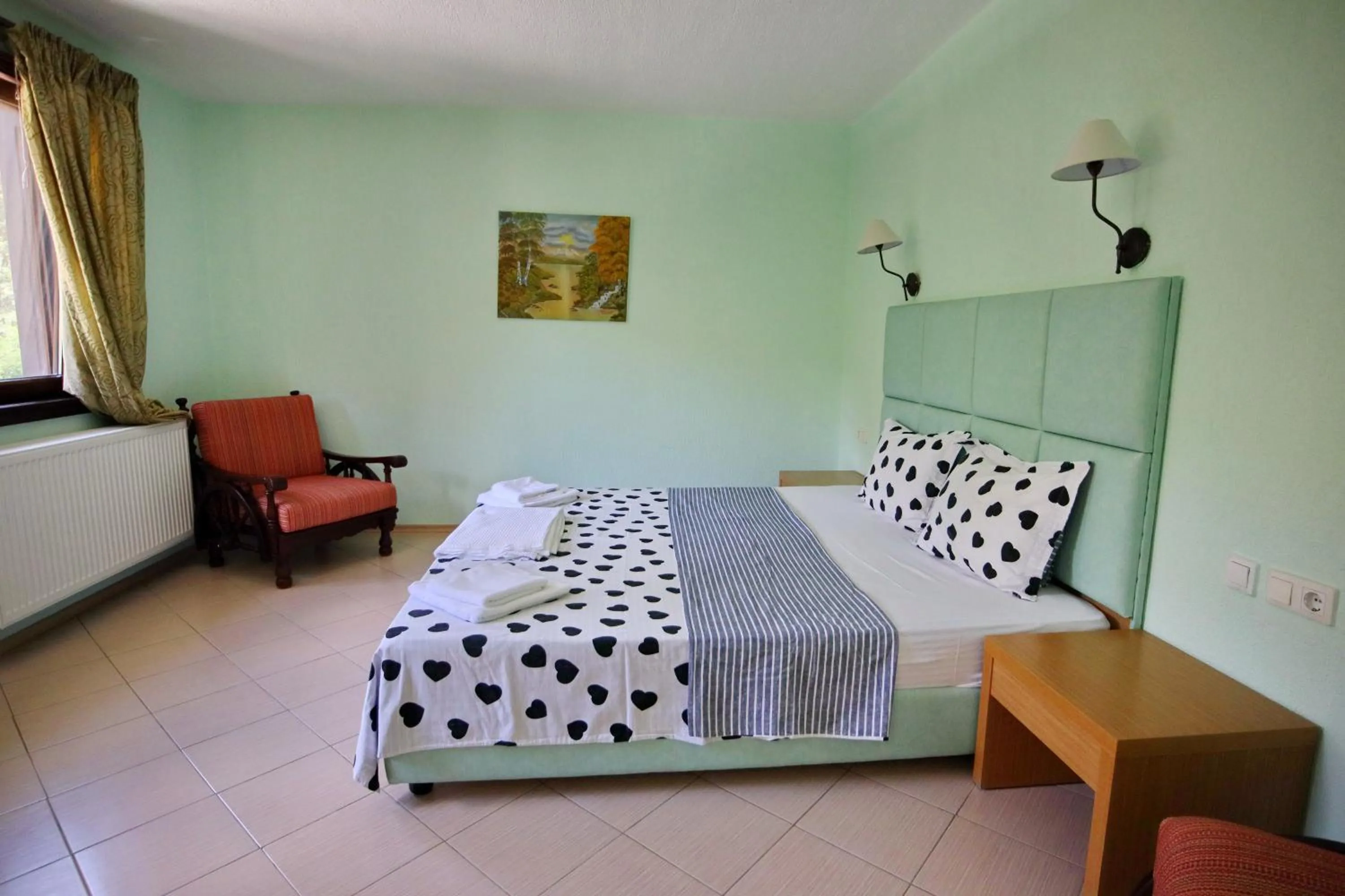 Bed in Elli Greco Hotel