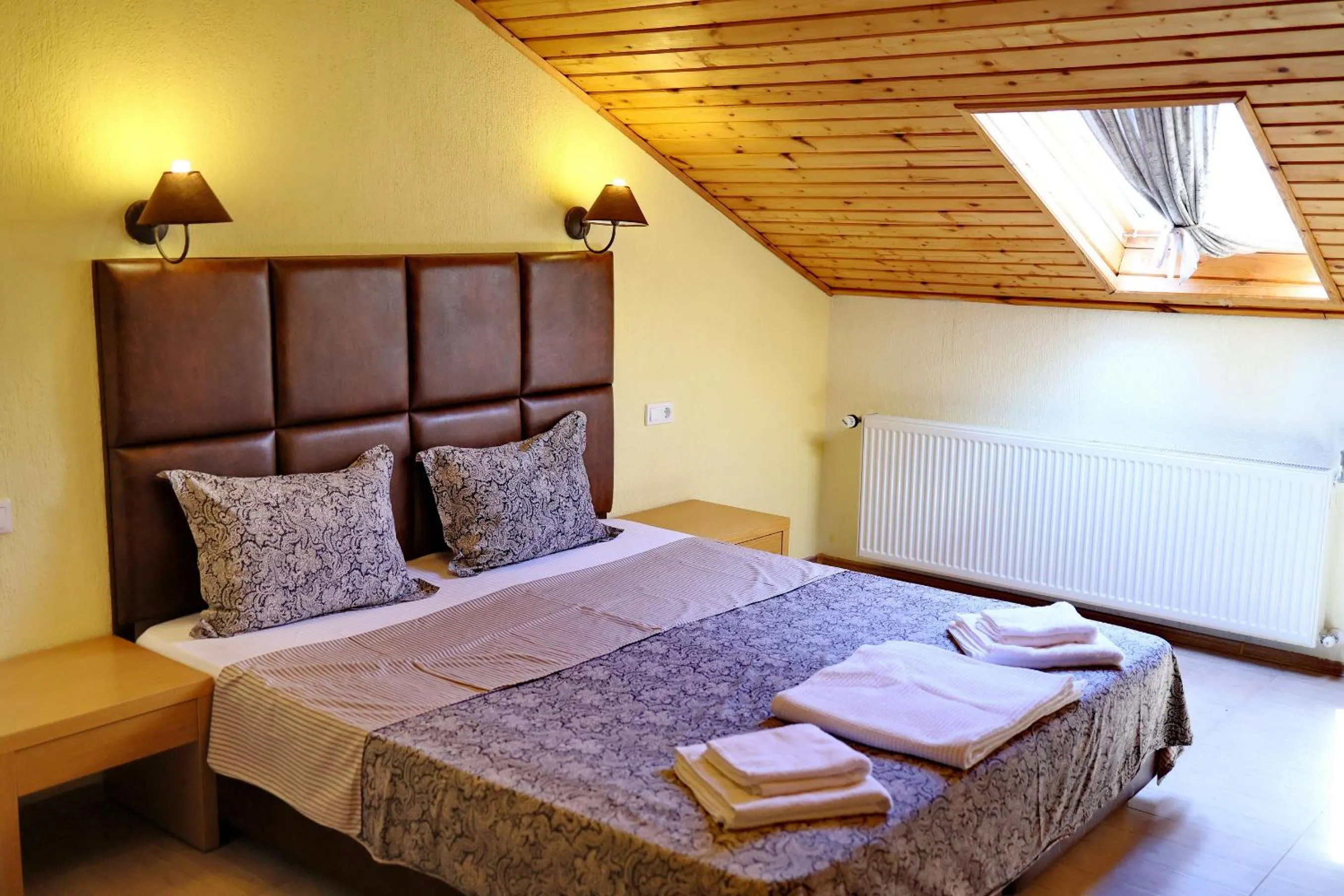 Bed in Elli Greco Hotel