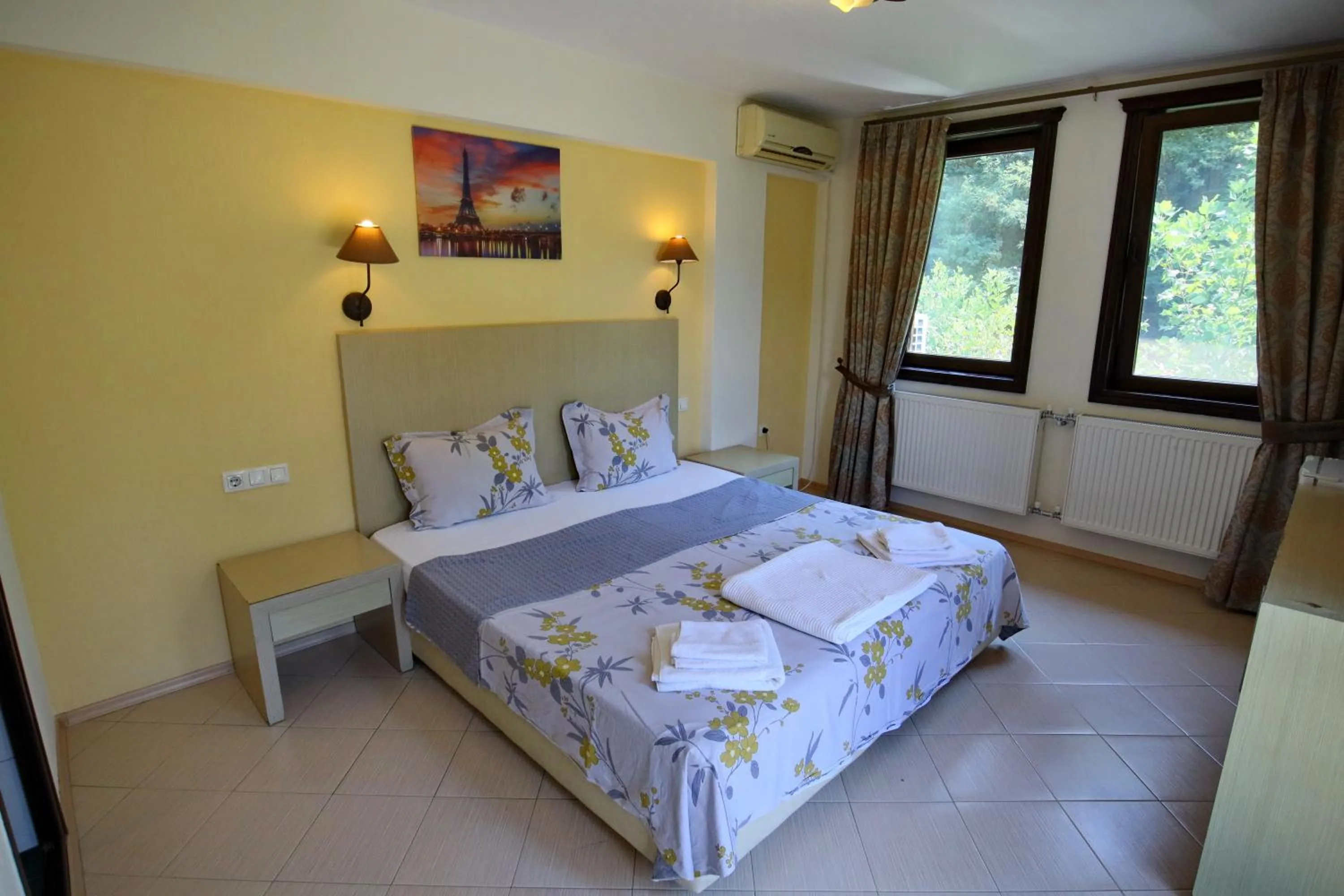 Bed in Elli Greco Hotel