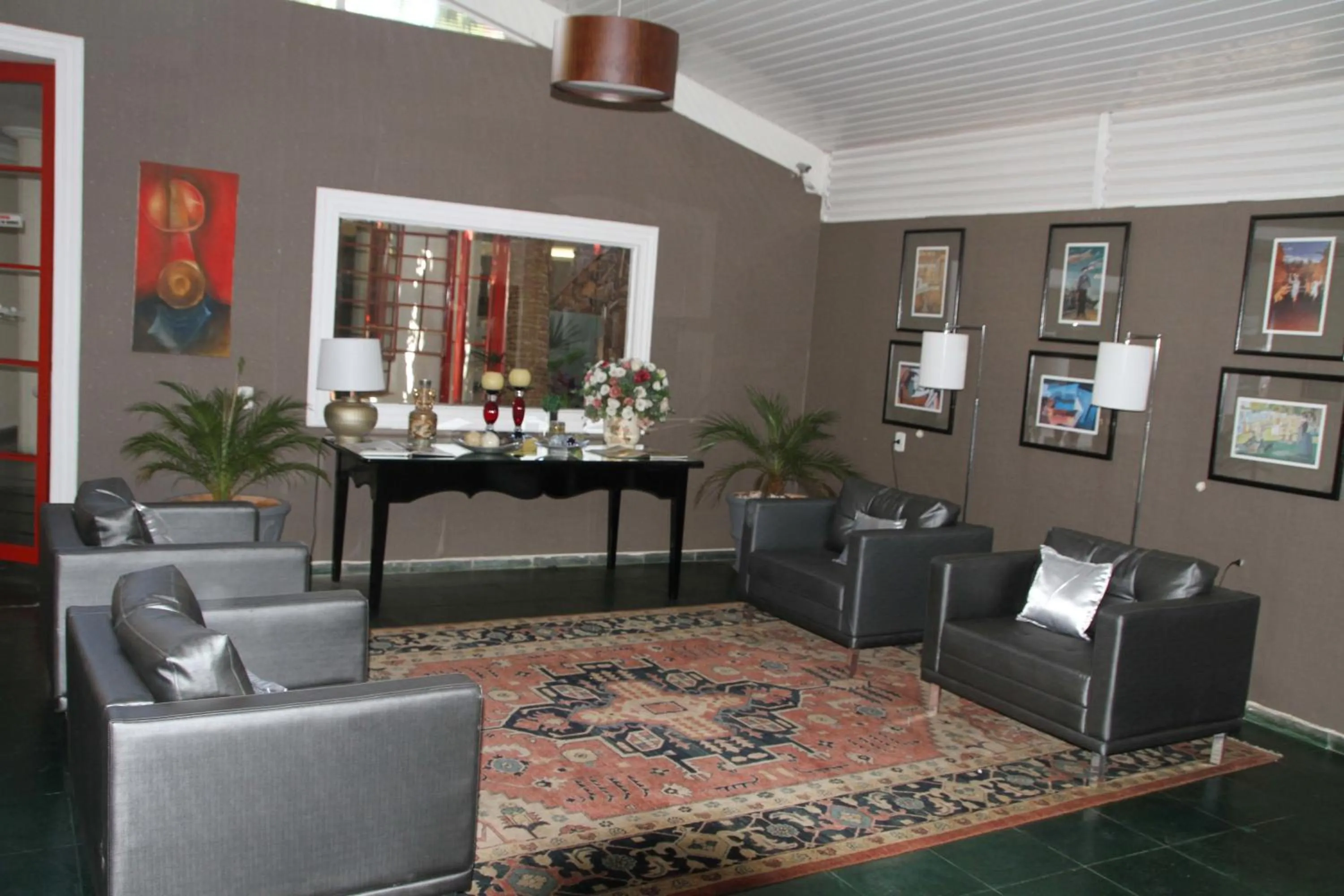 Communal lounge/ TV room in Villa Verde Hotel