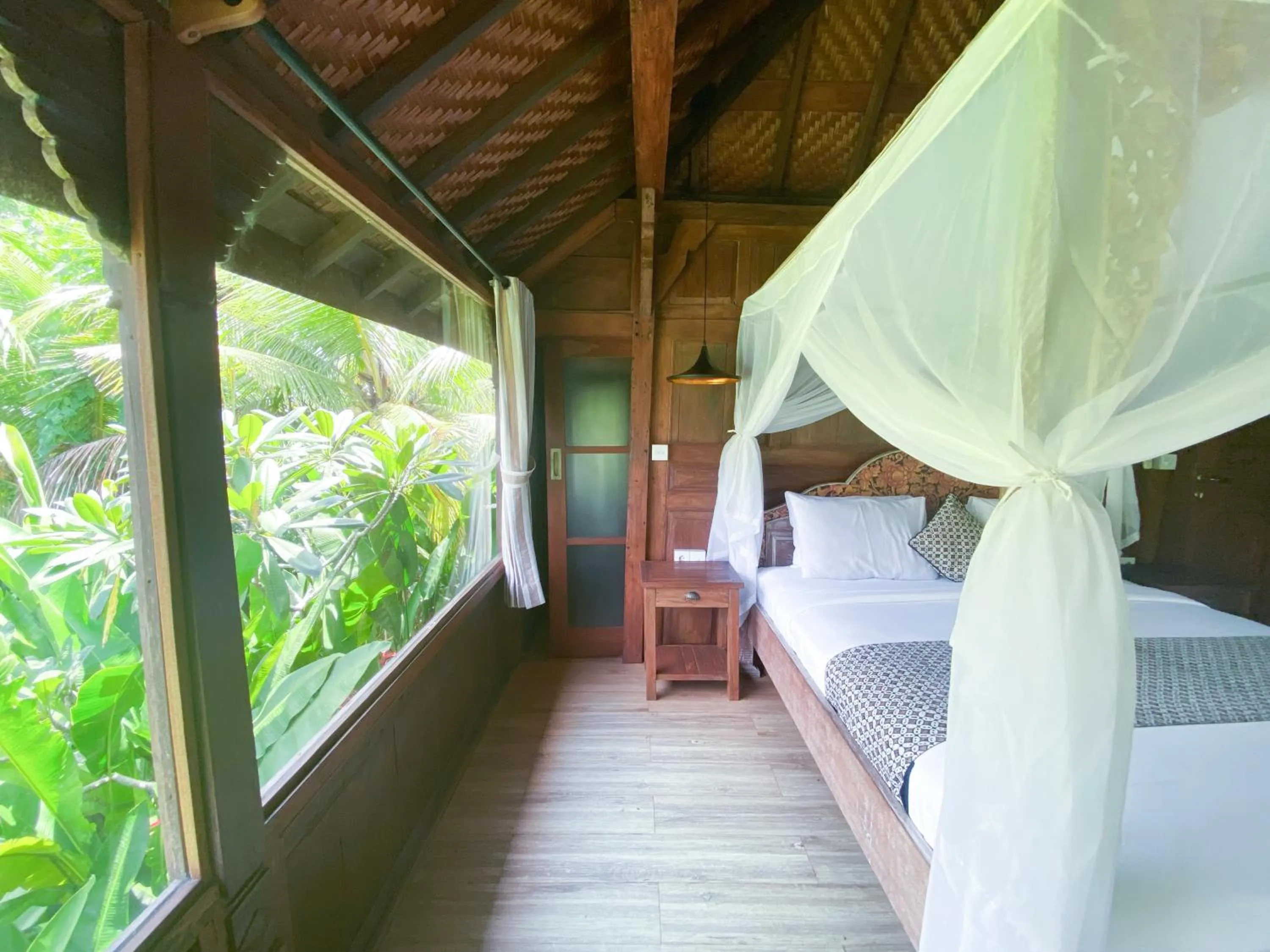 Bed in Gusde Tranquil Villas by EPS