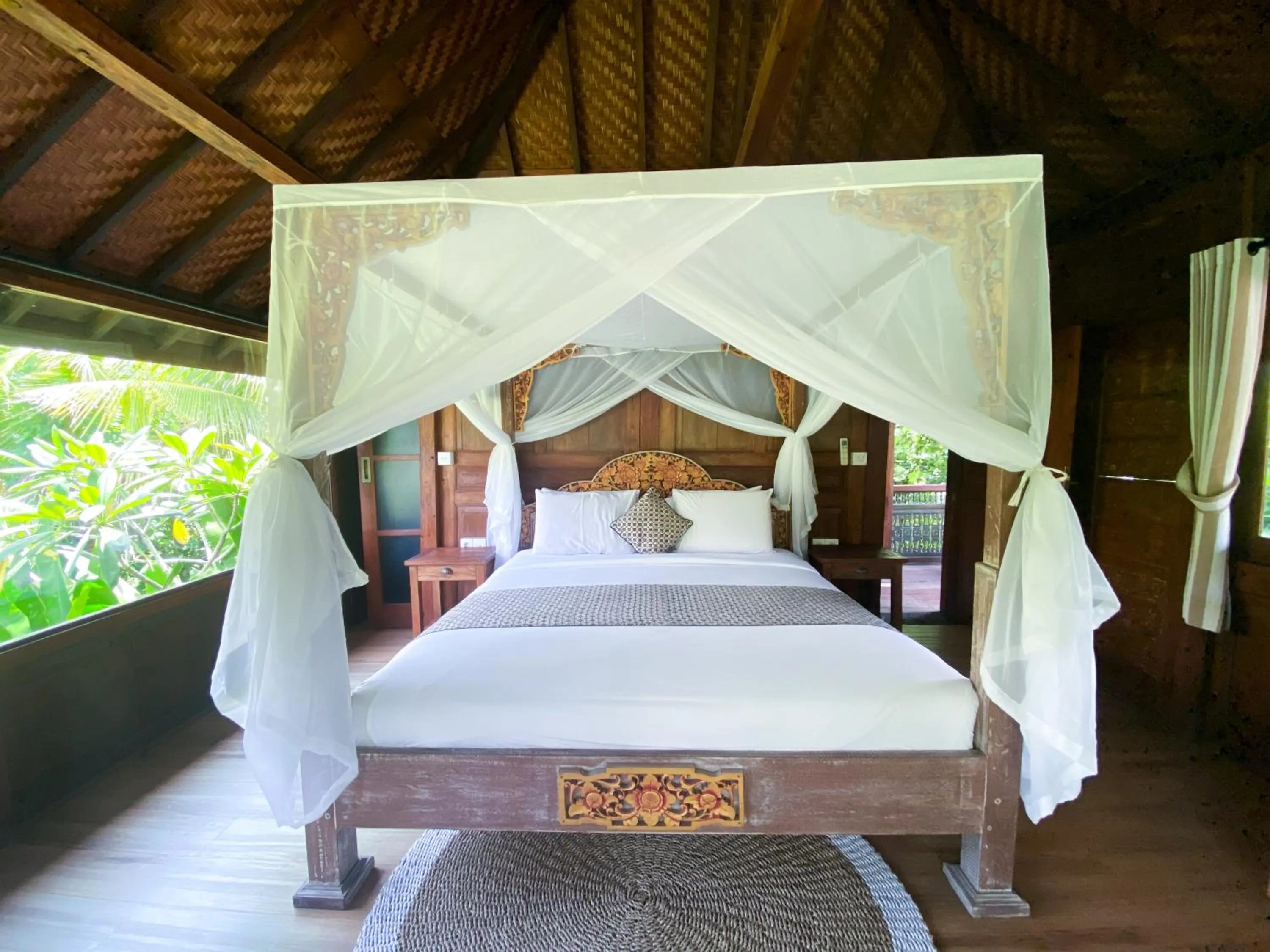 Bed in Gusde Tranquil Villas by EPS