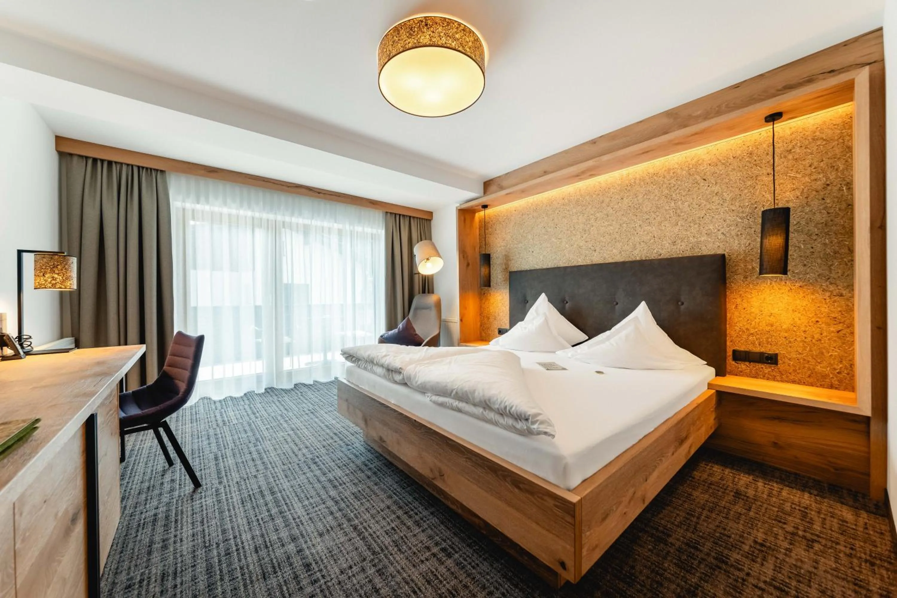 Bed in Kräuterhotel Hochzillertal