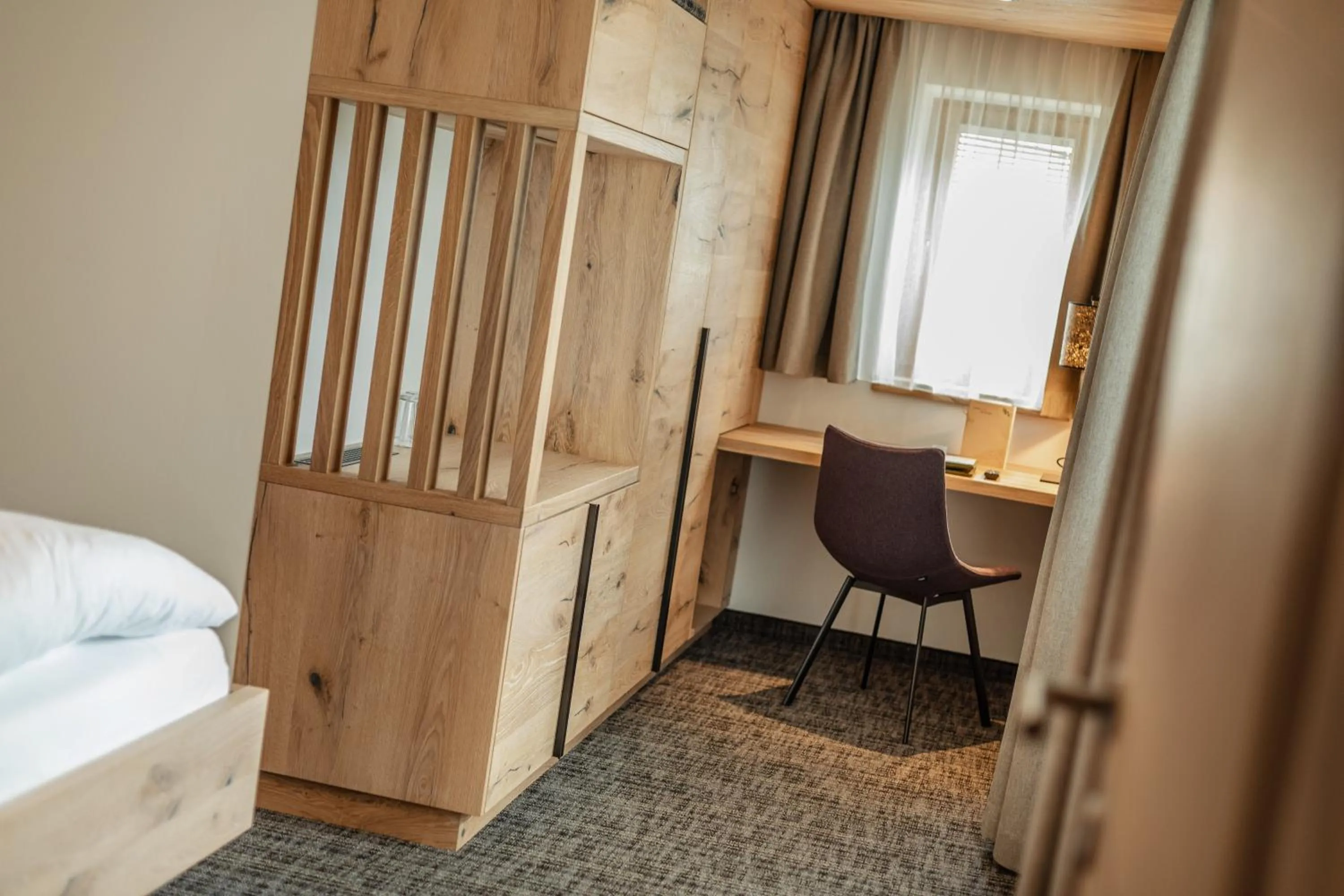 Photo of the whole room, Bed in Kräuterhotel Hochzillertal