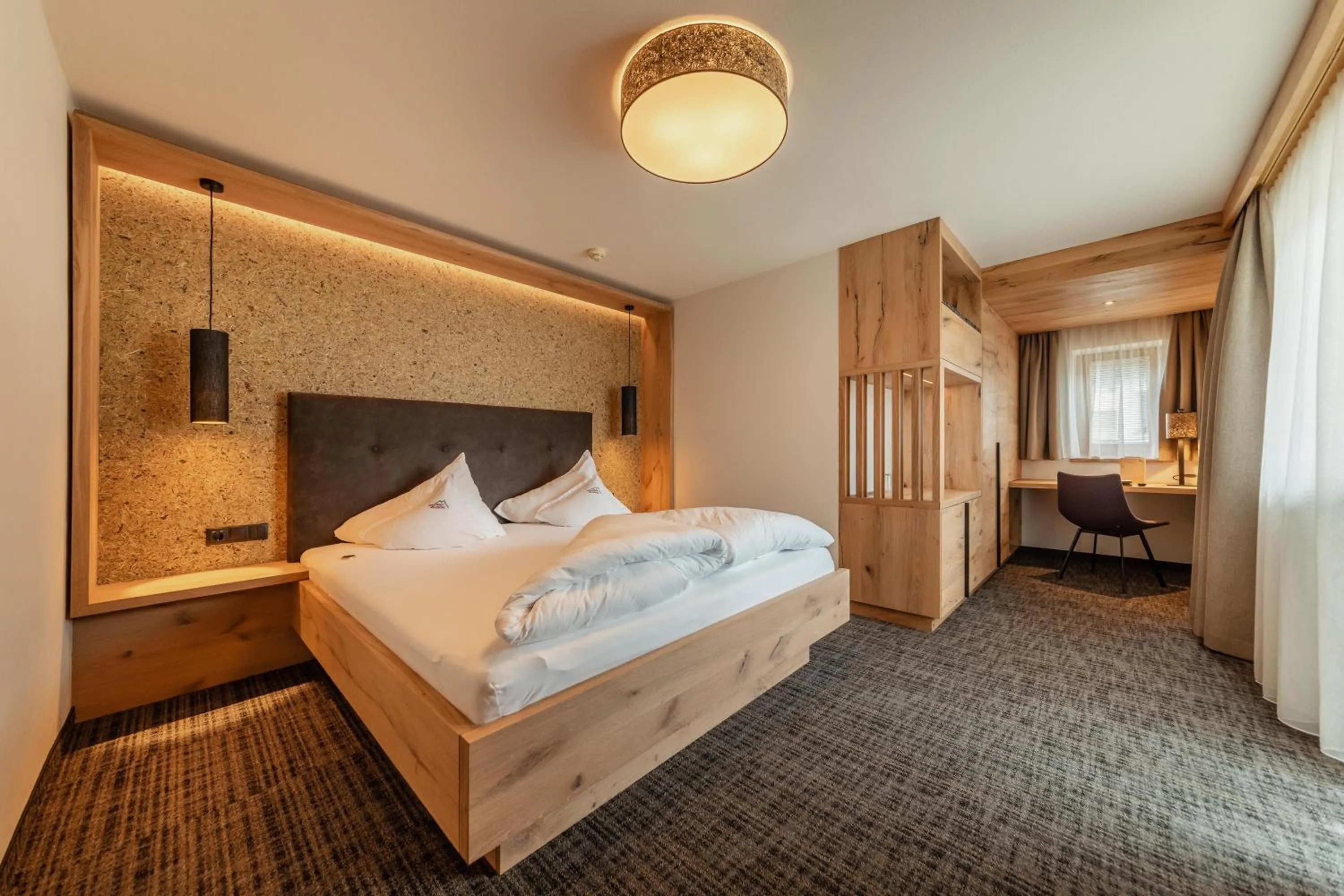 Bed in Kräuterhotel Hochzillertal