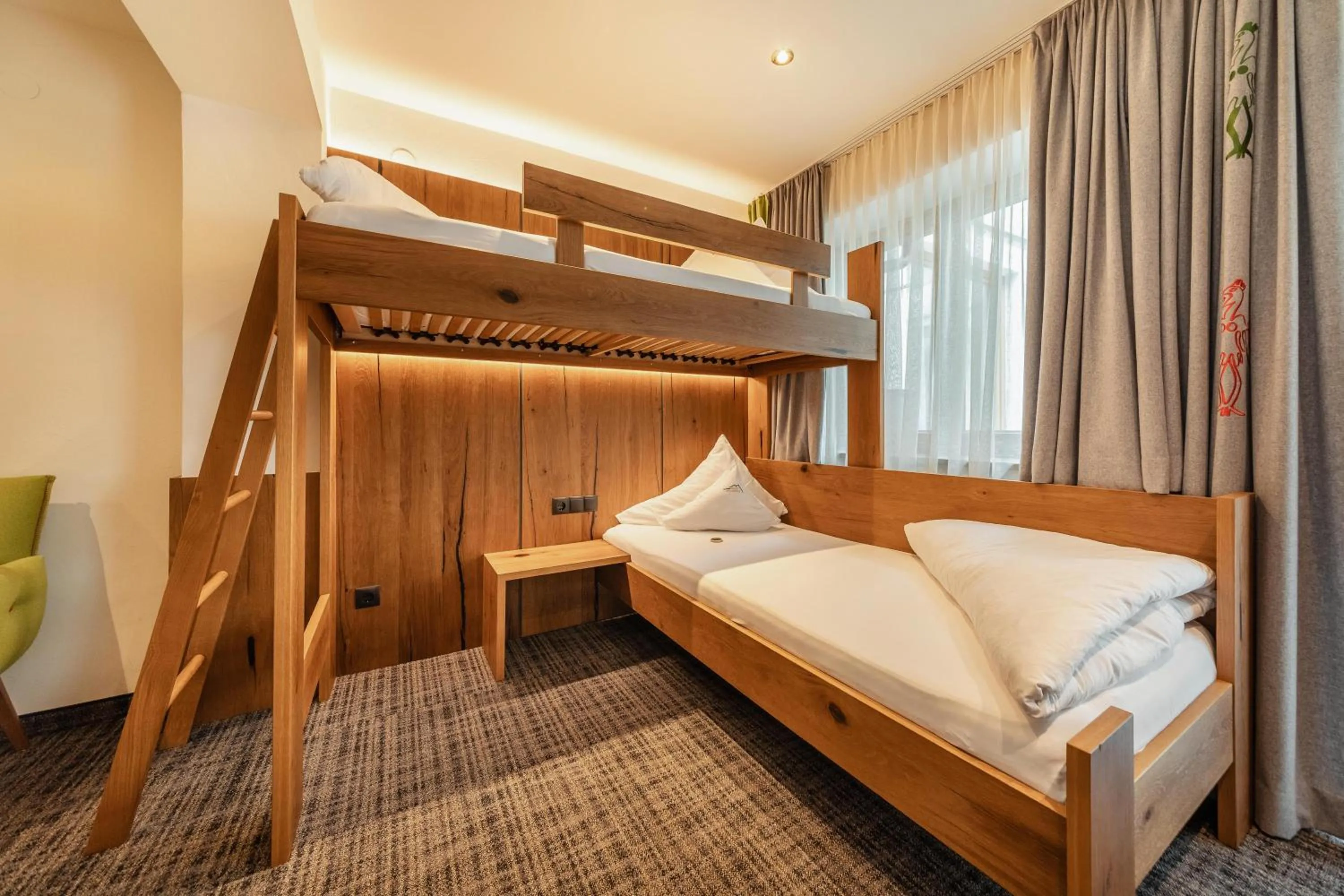 Bed in Kräuterhotel Hochzillertal