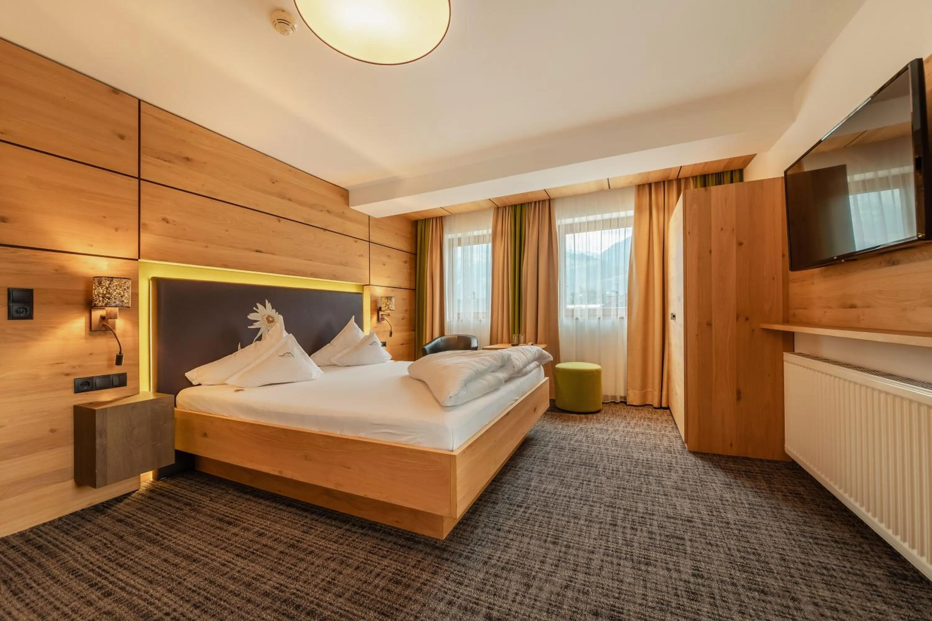 Bed in Kräuterhotel Hochzillertal