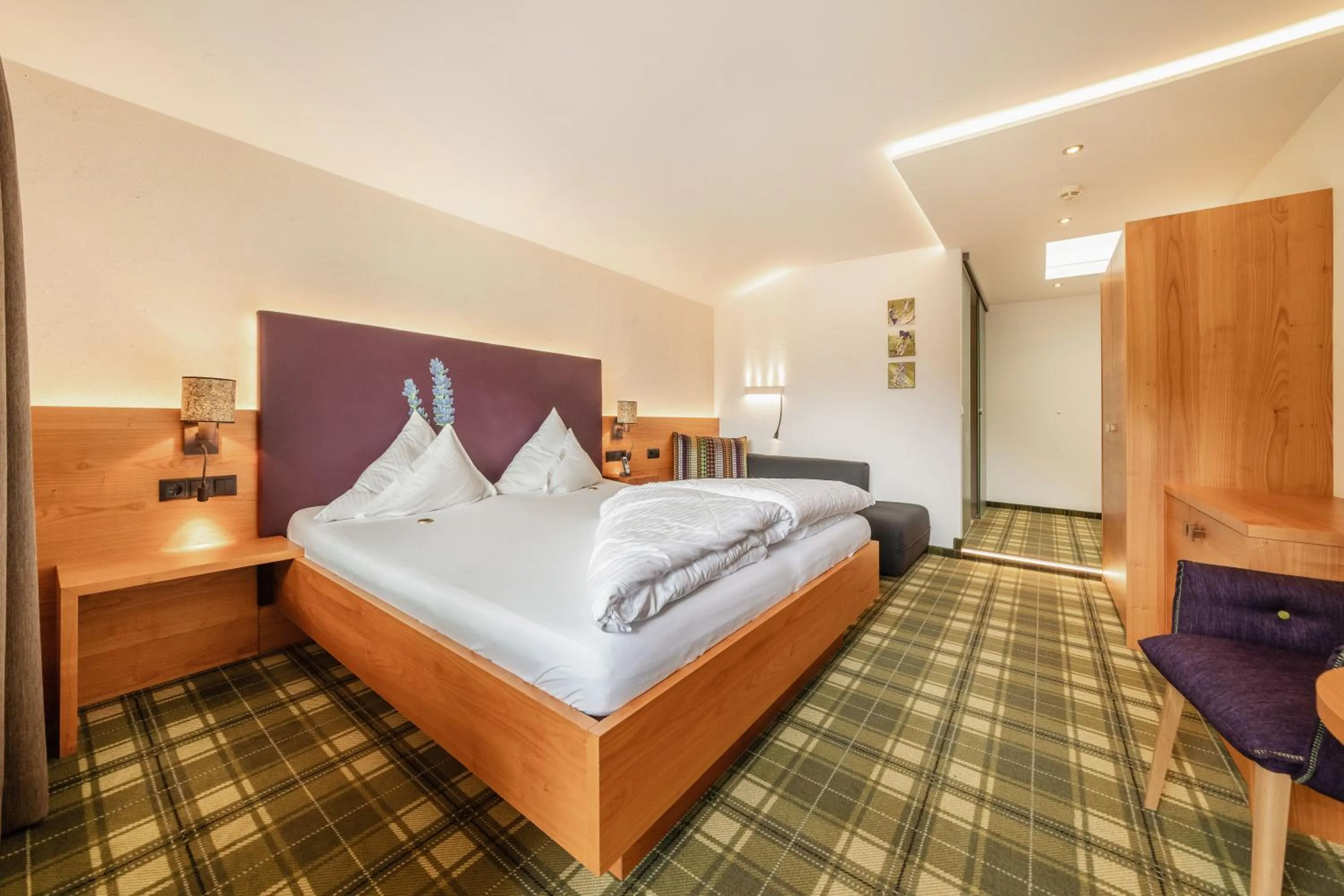 Bed in Kräuterhotel Hochzillertal