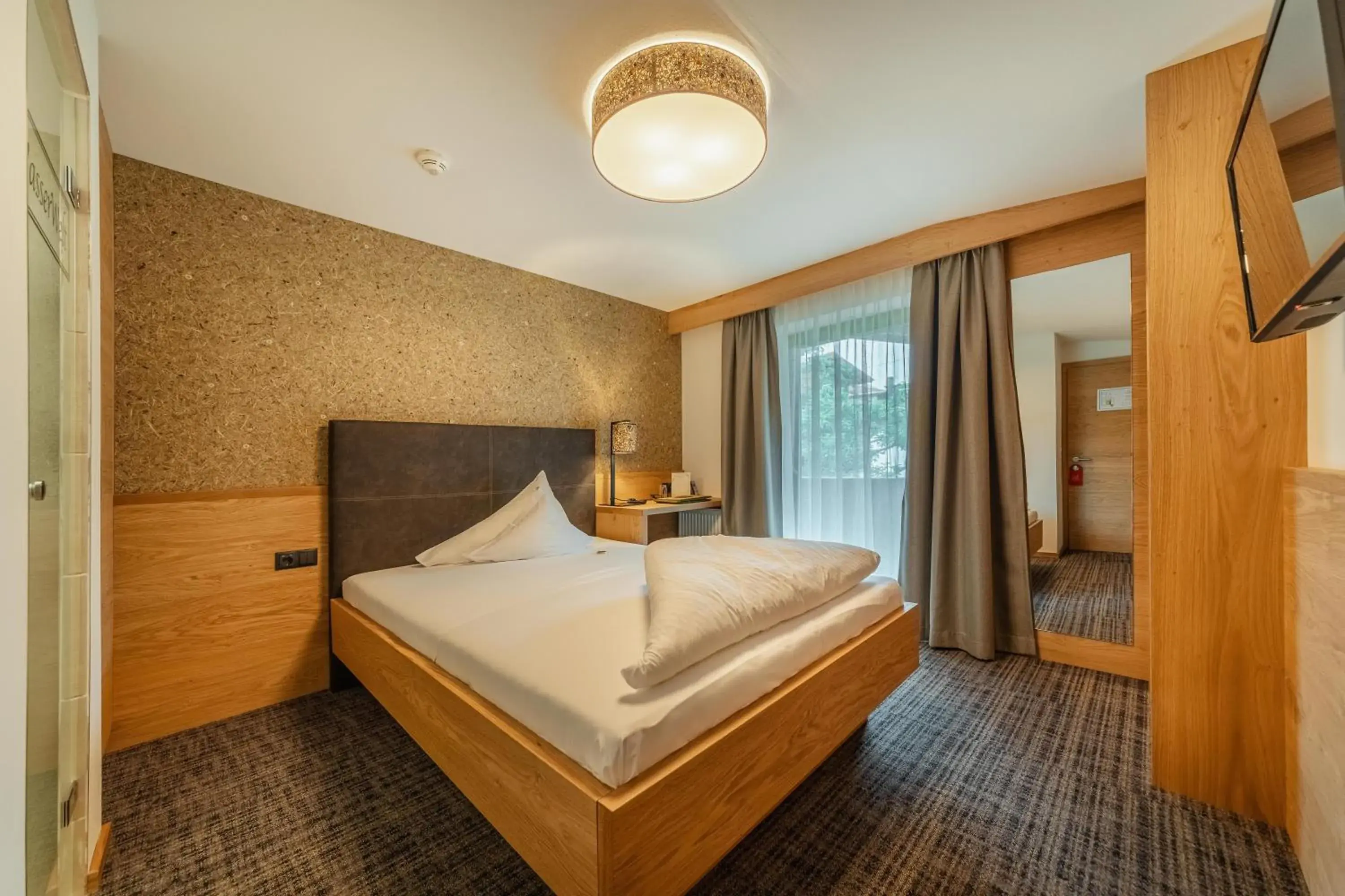 Single Room with Balcony in Kräuterhotel Hochzillertal Single Room with Balcony in Kräuterhotel Hochzillertal