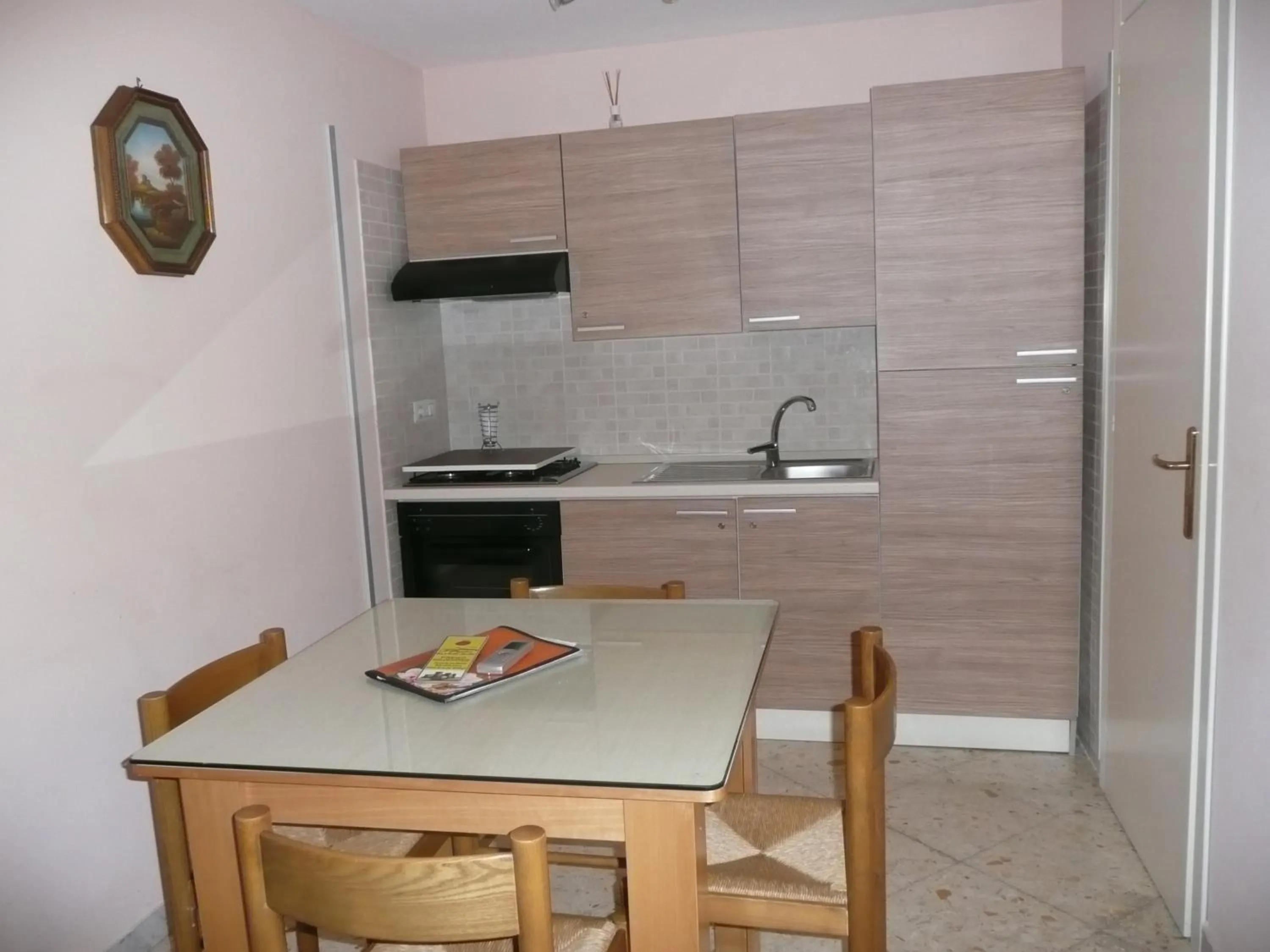 Kitchen or kitchenette in I Papiri B&B Aparthotel