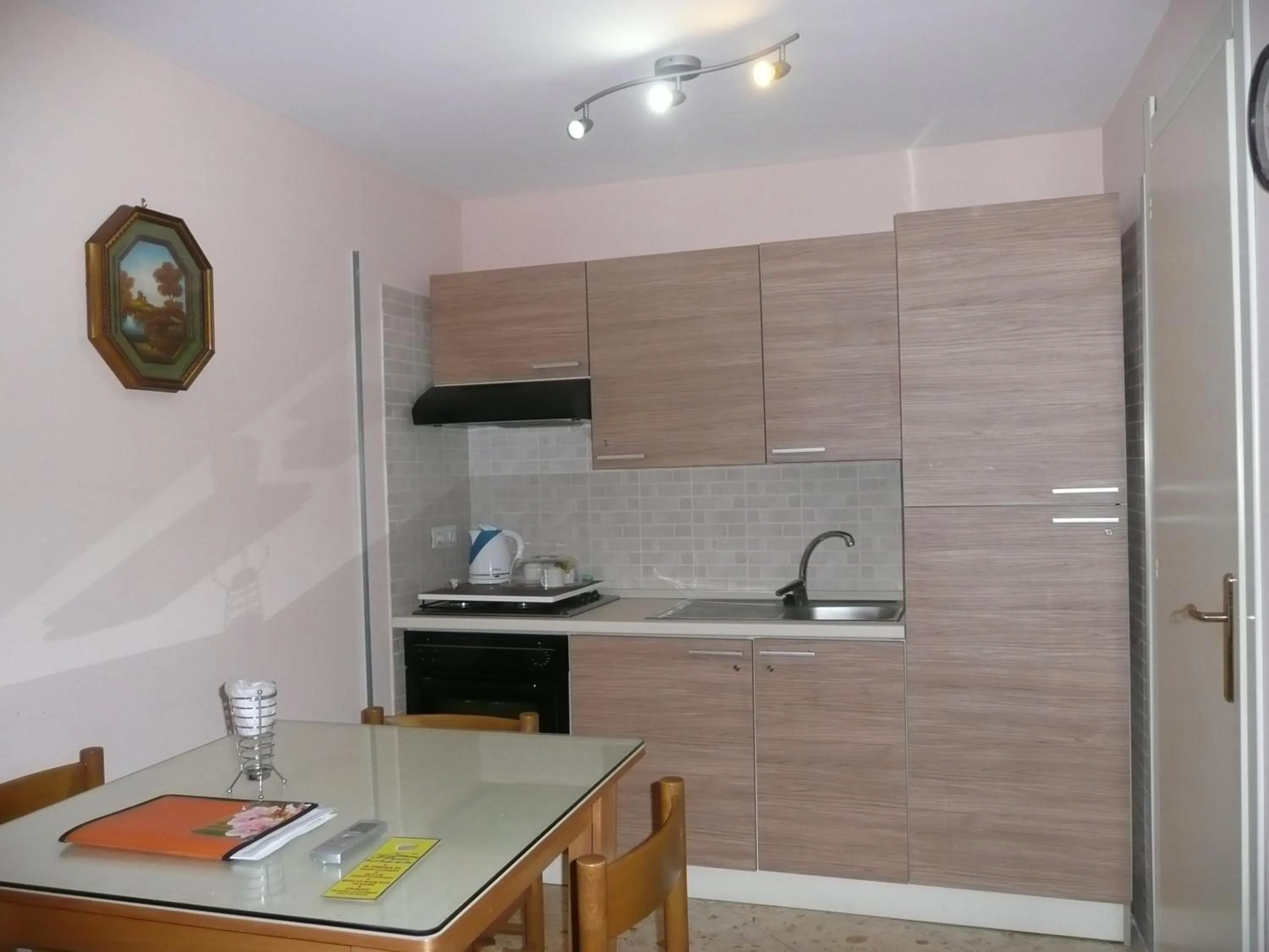 Kitchen or kitchenette in I Papiri B&B Aparthotel