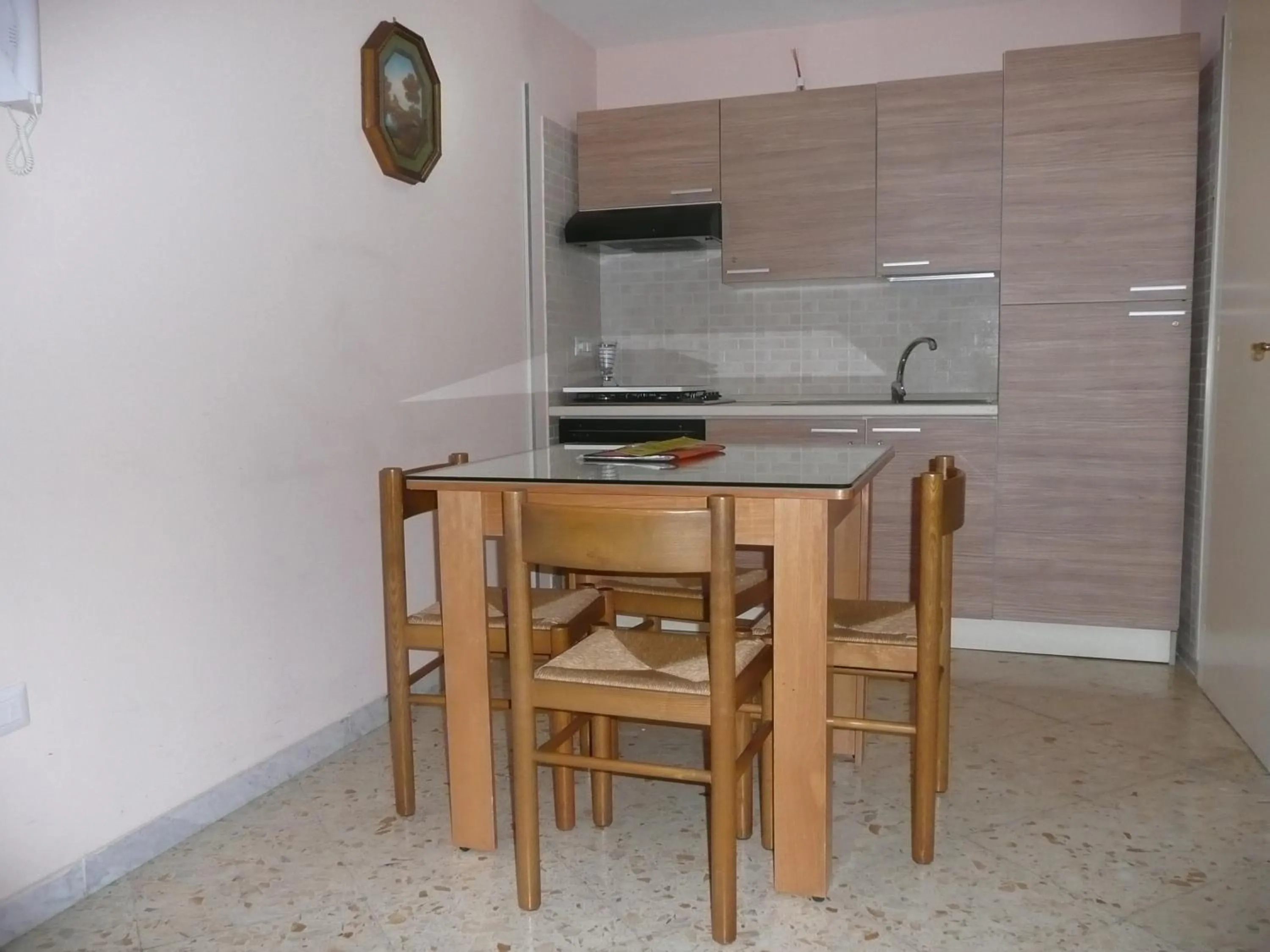 Kitchen or kitchenette in I Papiri B&B Aparthotel