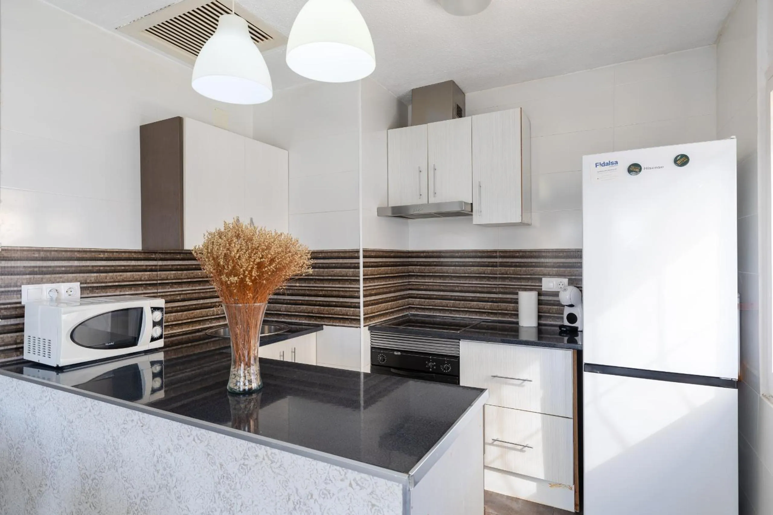 Kitchen or kitchenette in Fidalsa Relax Pool & BBQ