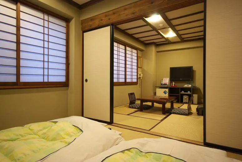 Bed in Shimizu City Hotel