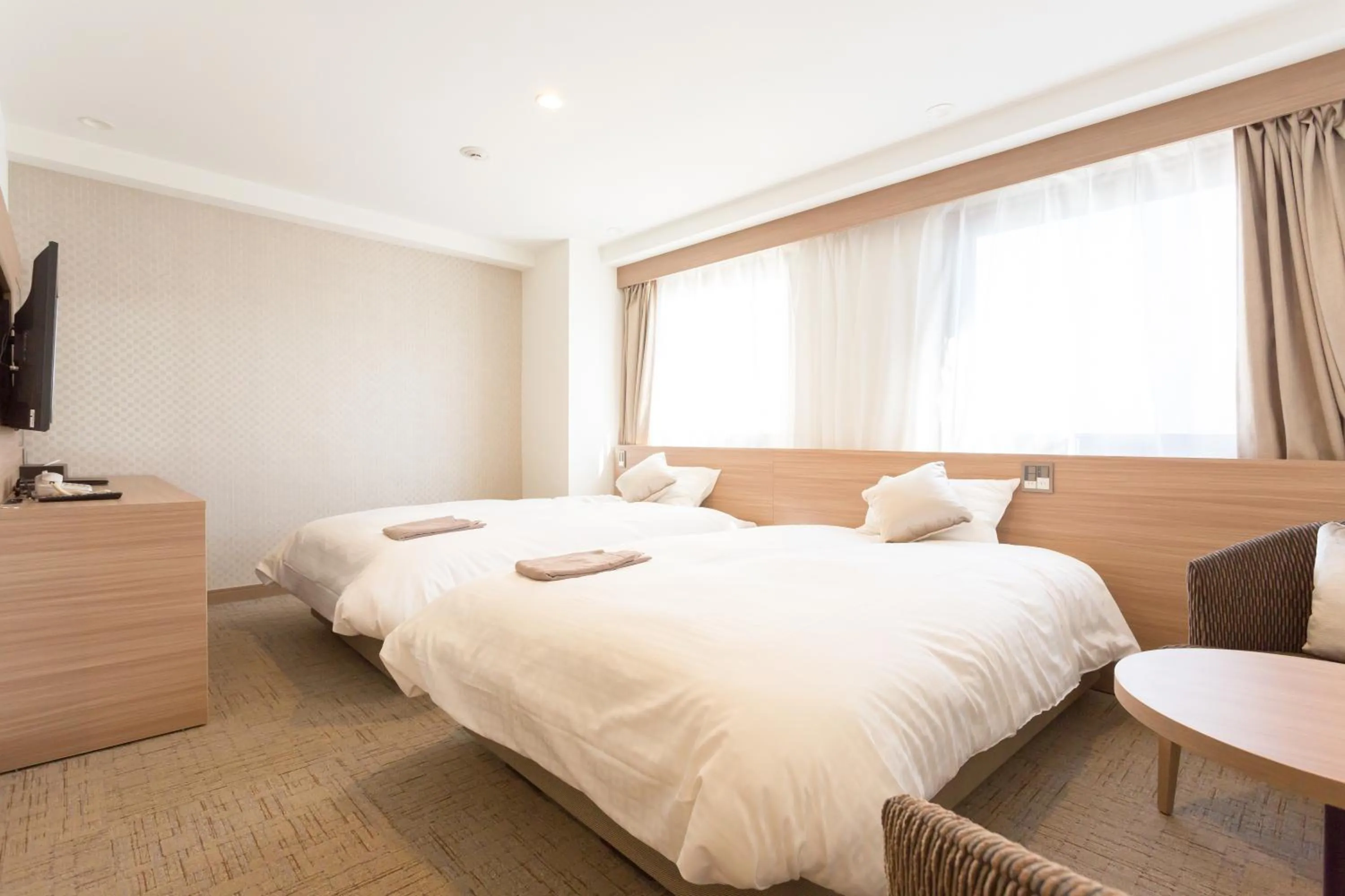 Bed in Shimizu City Hotel