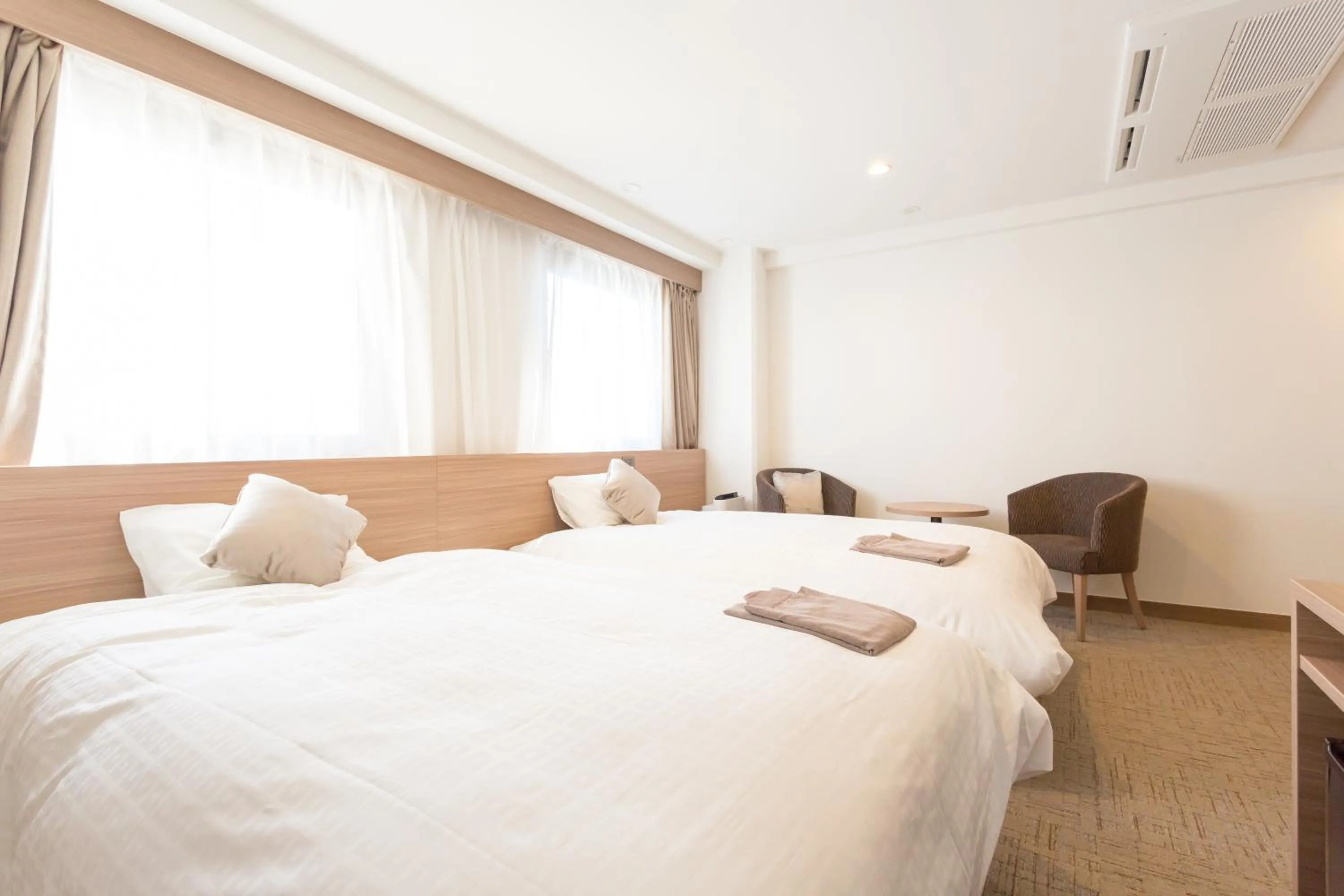 Bed in Shimizu City Hotel